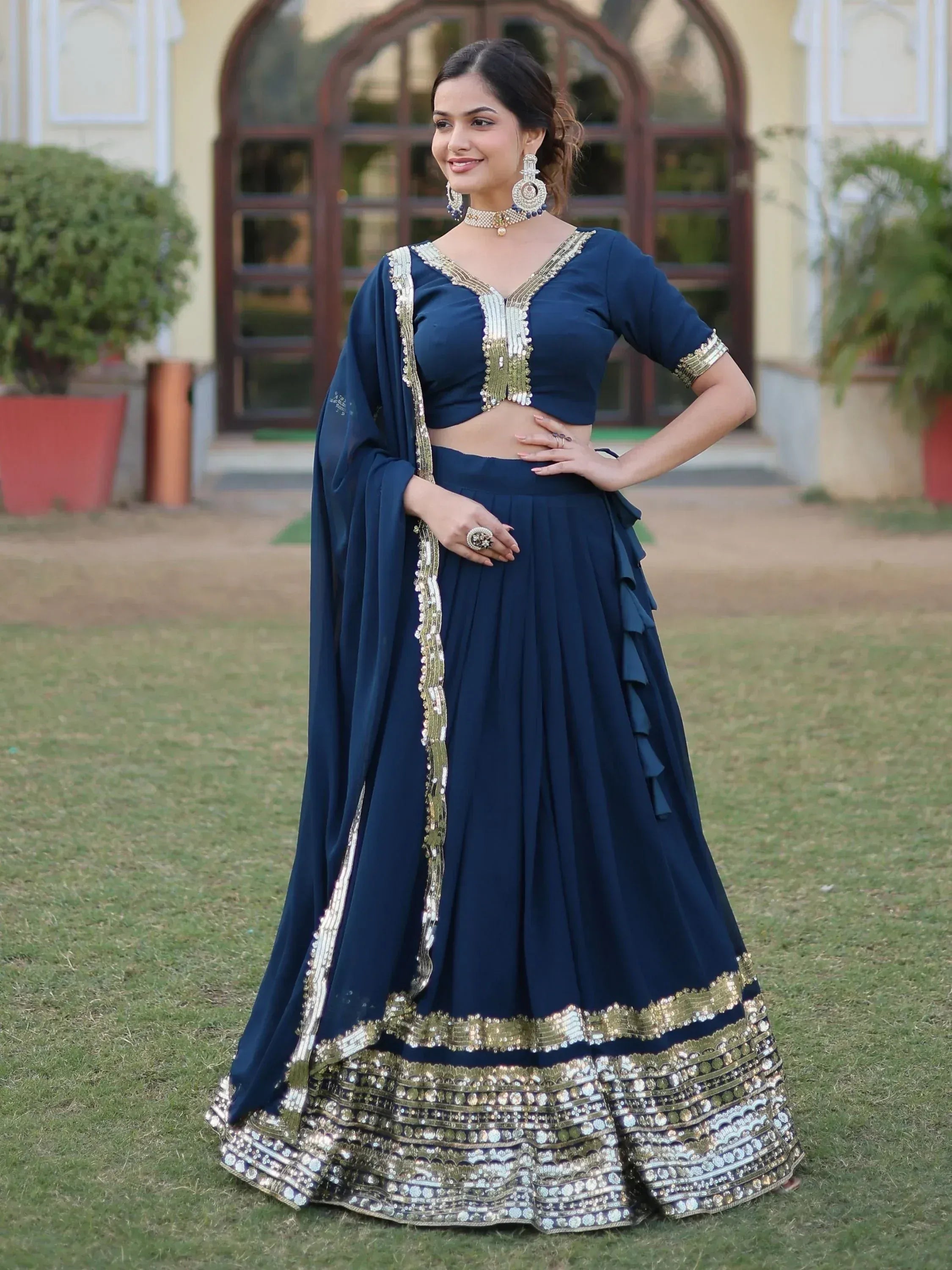 Navy blue designer lehenga choli with gold embroidery, perfect for Indian ethnic wear occasions
