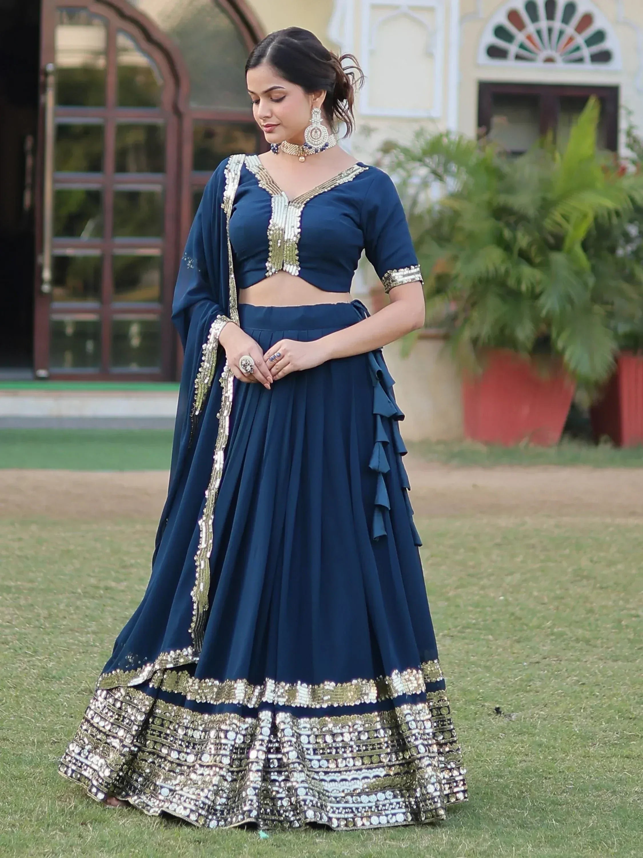 Navy blue designer lehenga choli with gold embroidery, perfect for Indian ethnic wear events