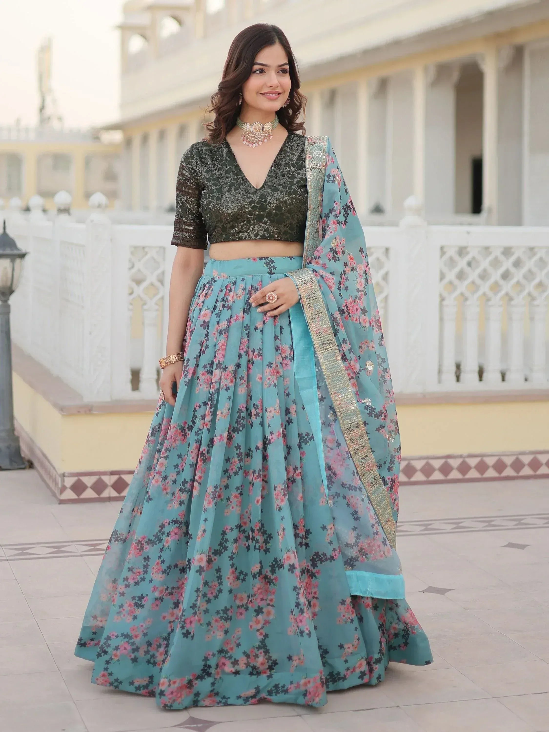 Woman in floral lehenga choli with sequin top, perfect for Indian ethnic wear occasions