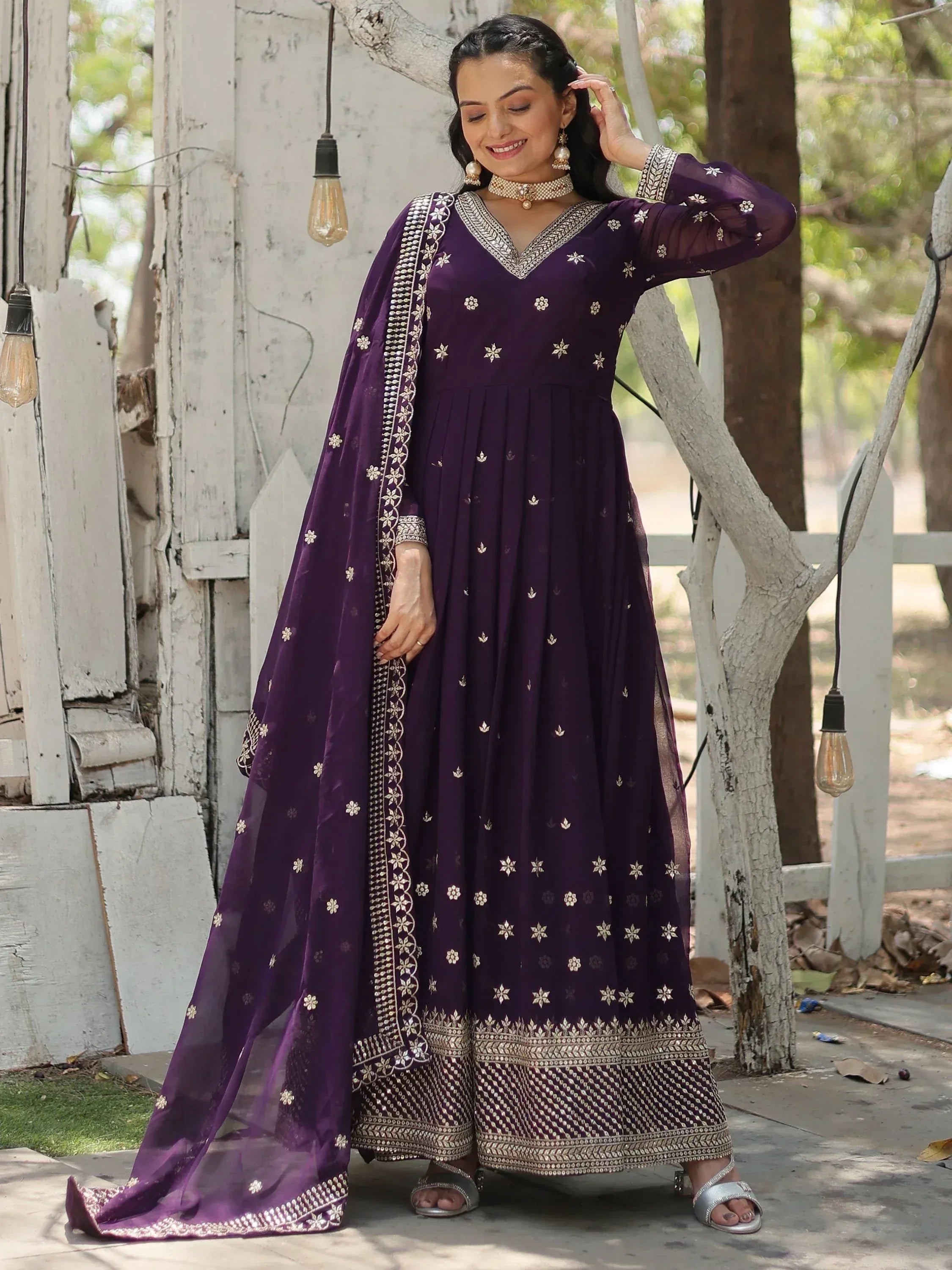 Purple embroidered anarkali suit with gold detailing, perfect for Indian ethnic wear occasions