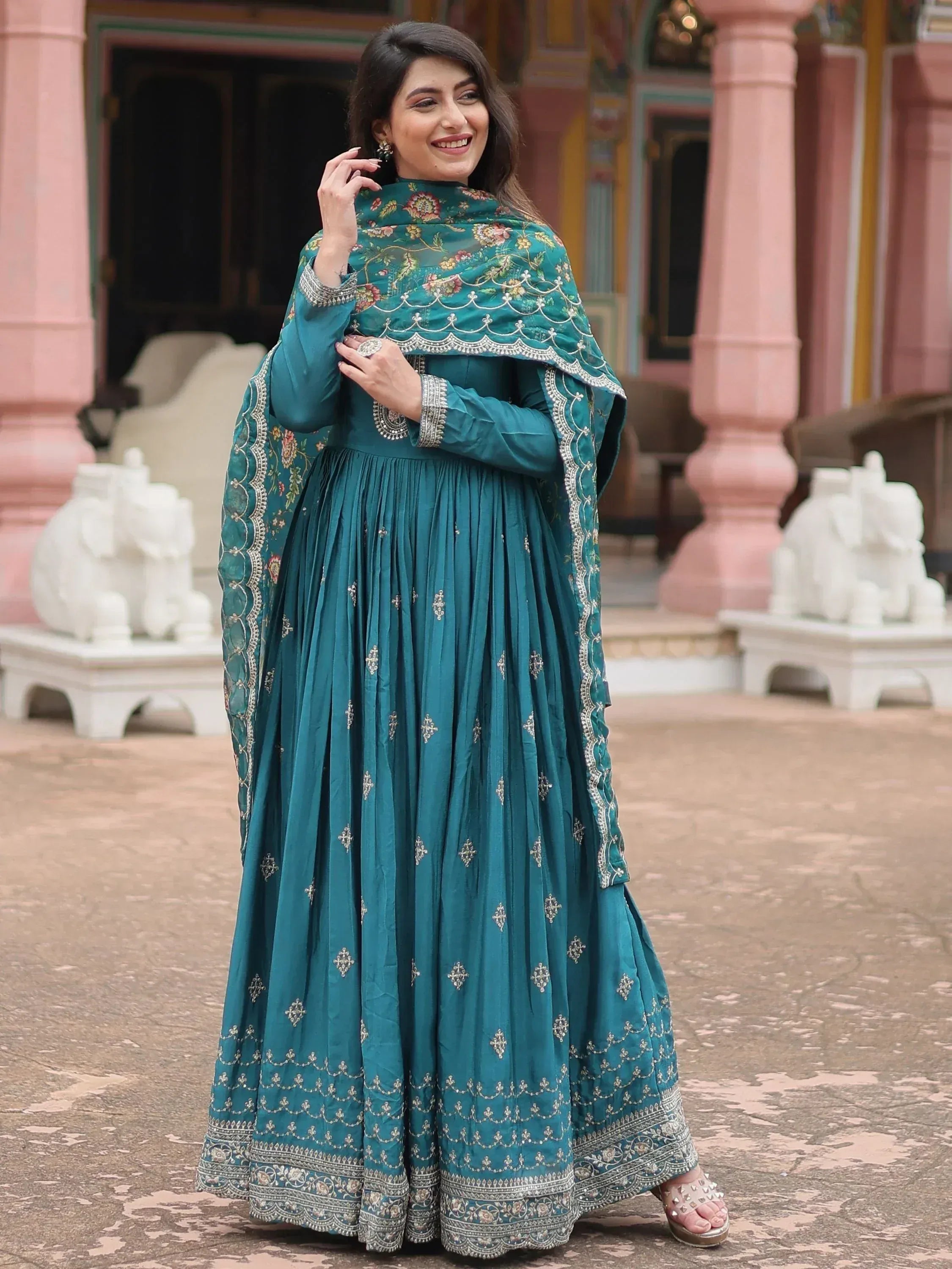 Teal embroidered anarkali suit with floral dupatta, perfect for Indian ethnic wear occasions.