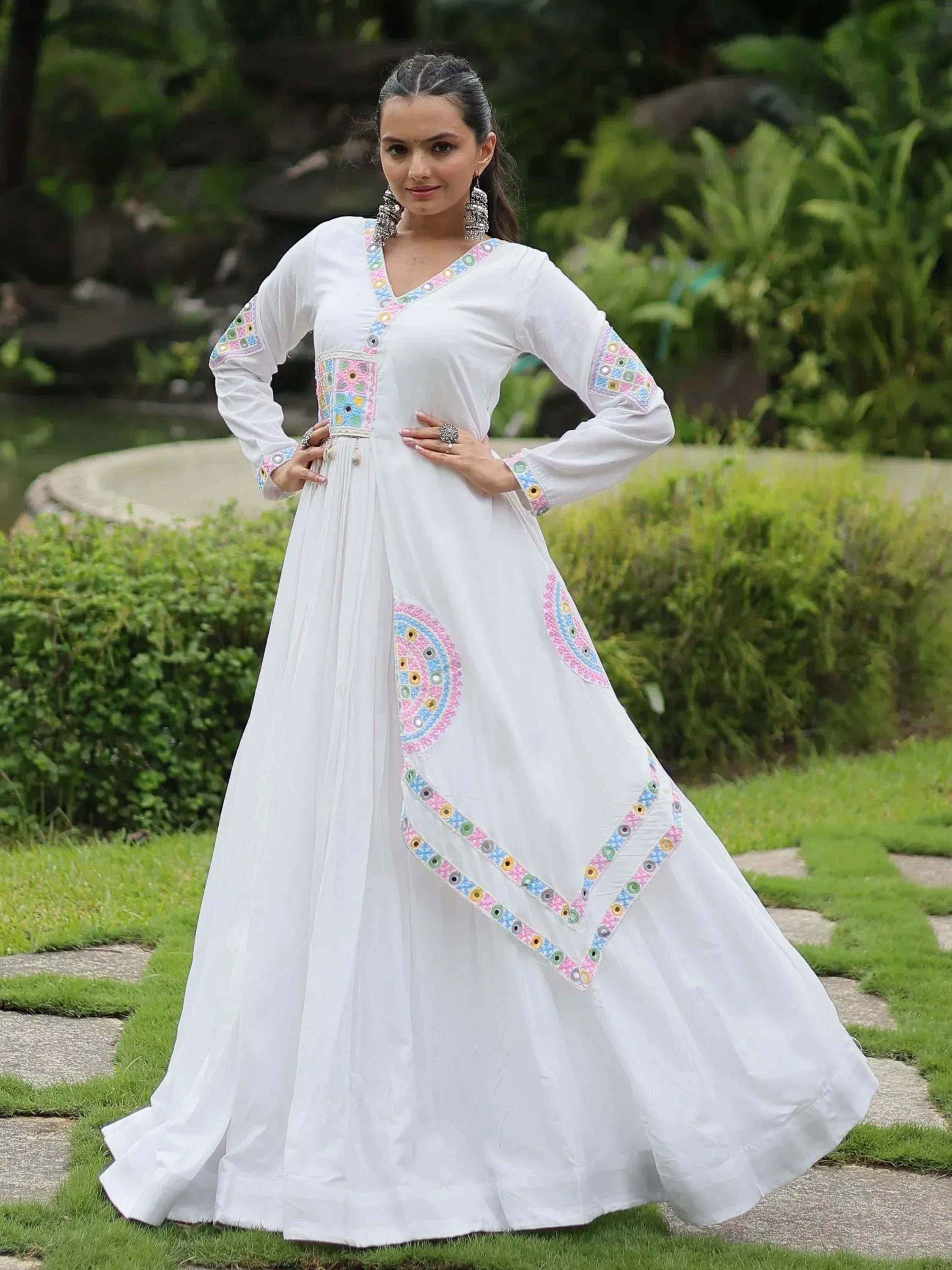 White ethnic gown with colorful mirror embroidery, perfect for Indian festive wear