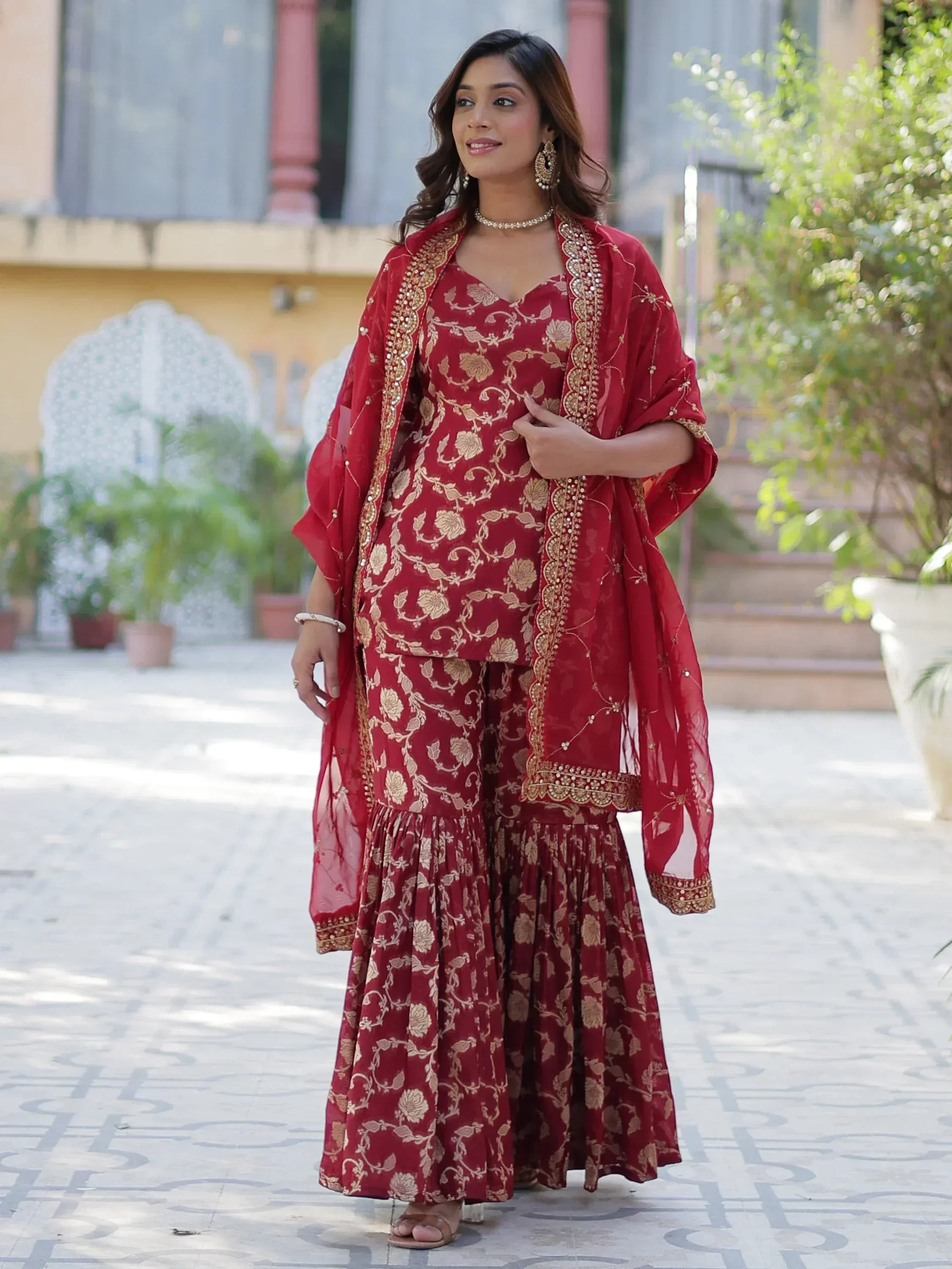 Red floral ethnic salwar kameez with gold embroidery and dupatta