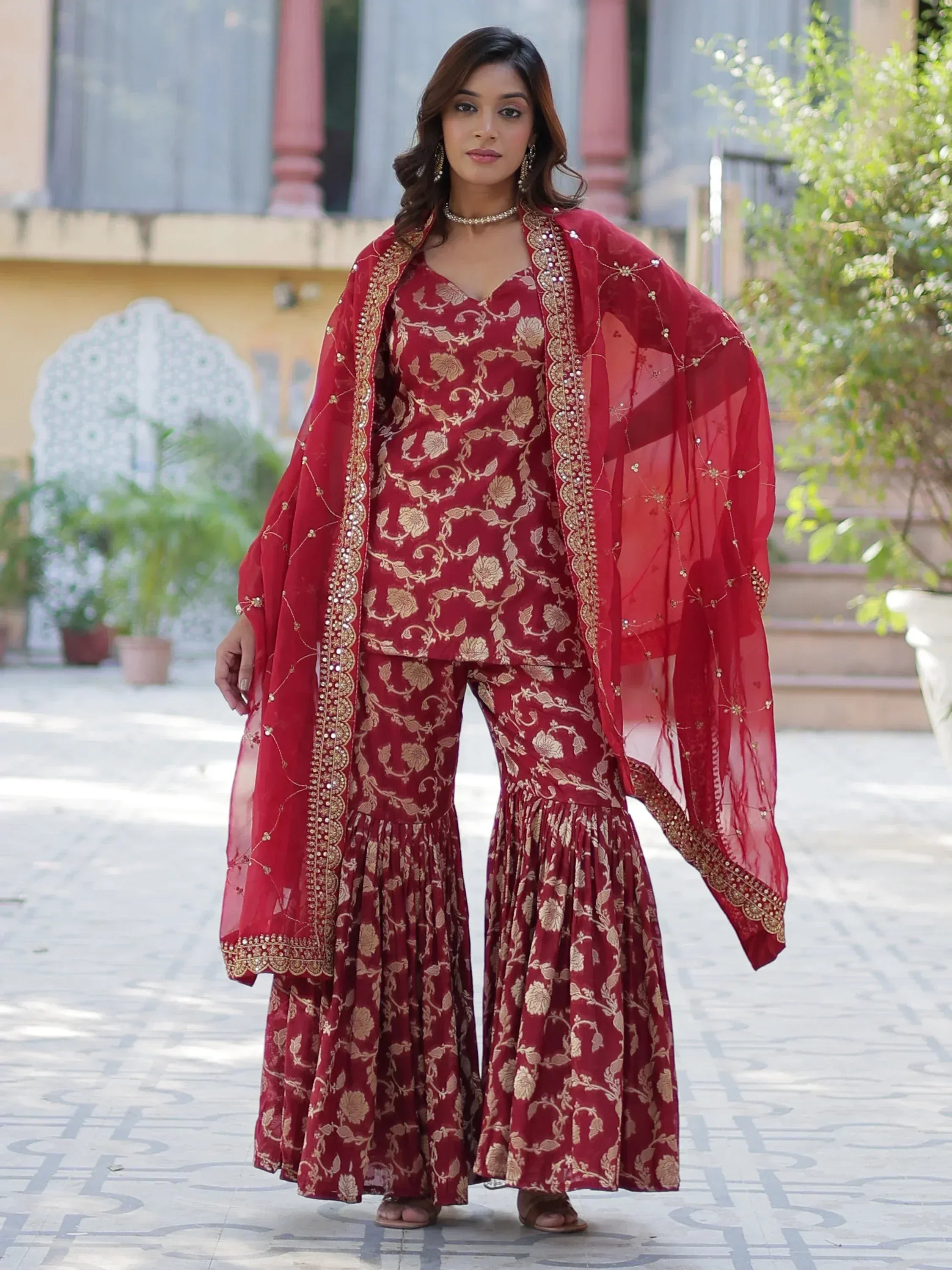 Red floral ethnic salwar kameez with gold embroidery and dupatta
