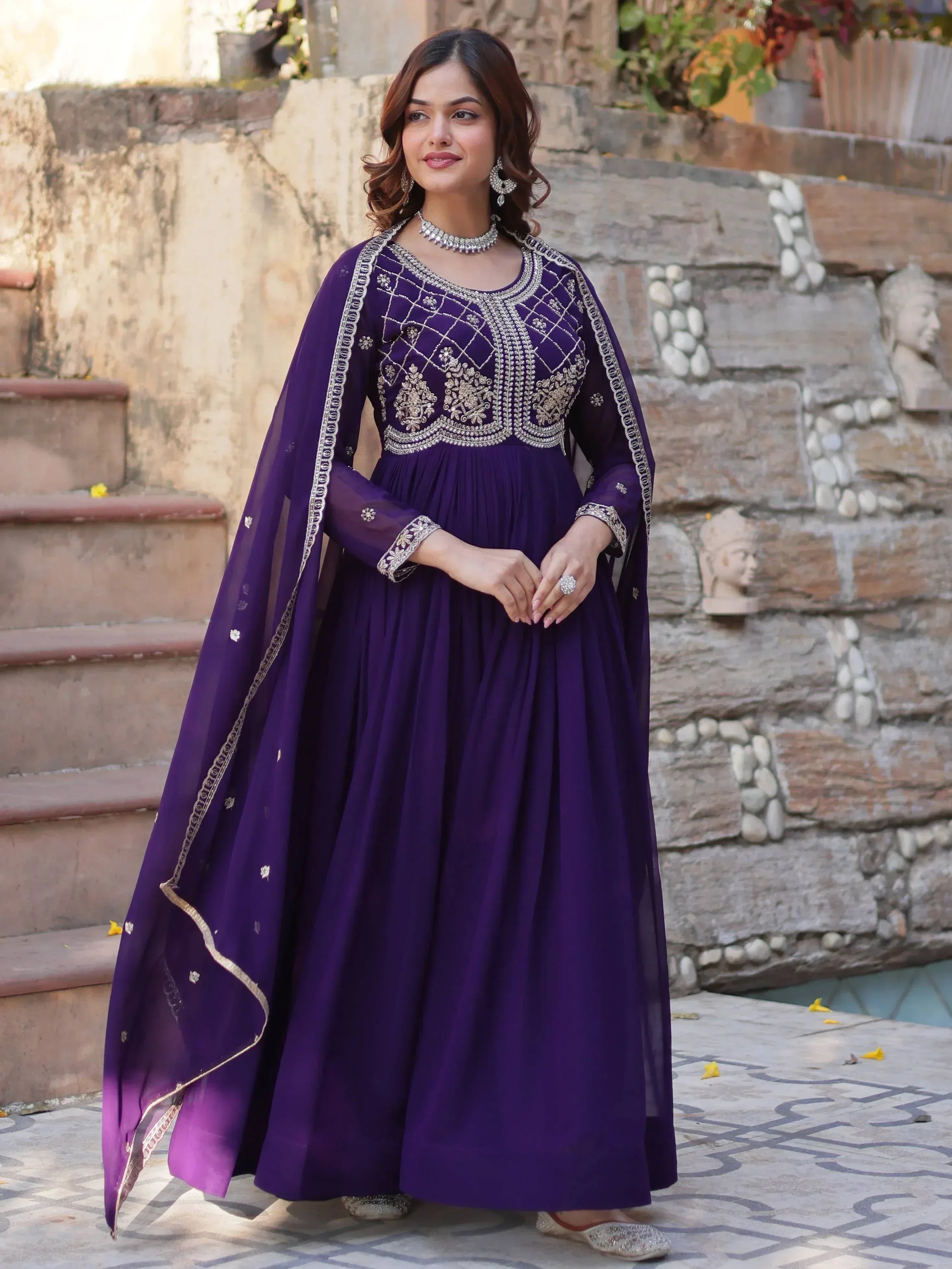 Purple embroidered ethnic gown with dupatta, perfect for Indian occasions and festive wear.