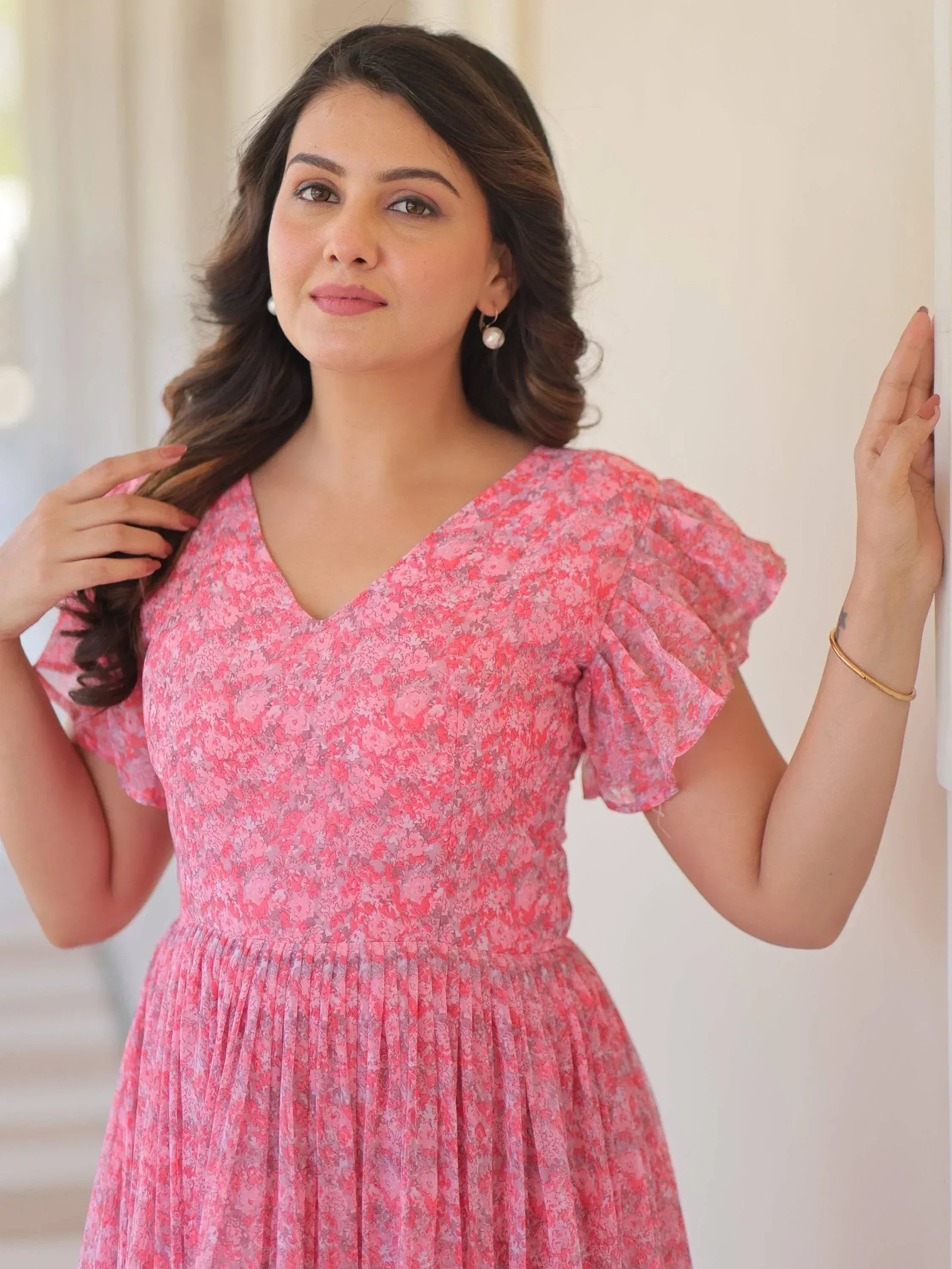 Pink floral ethnic gown with puff sleeves and V-neck, perfect for Indian occasions