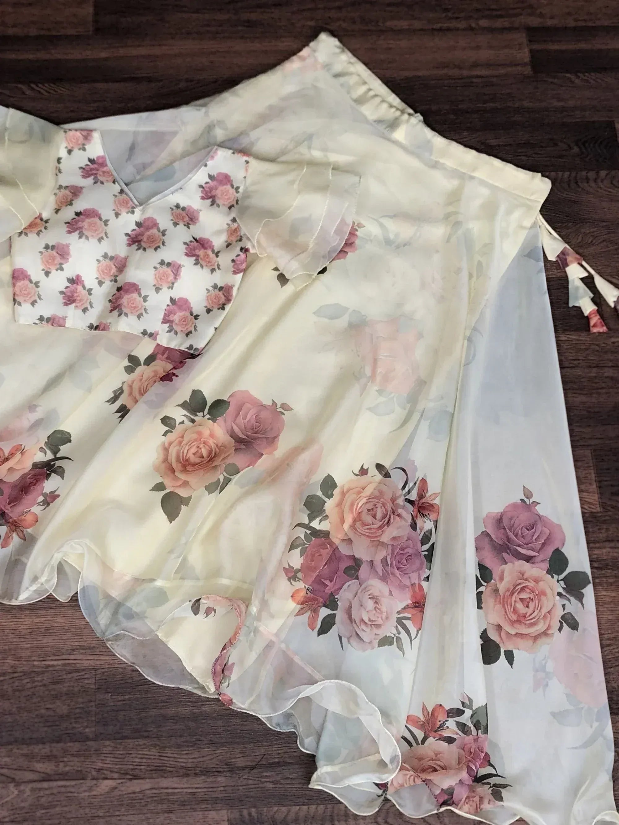 Floral print ethnic gown with sheer overlay and ruffled hem, perfect for Indian occasions