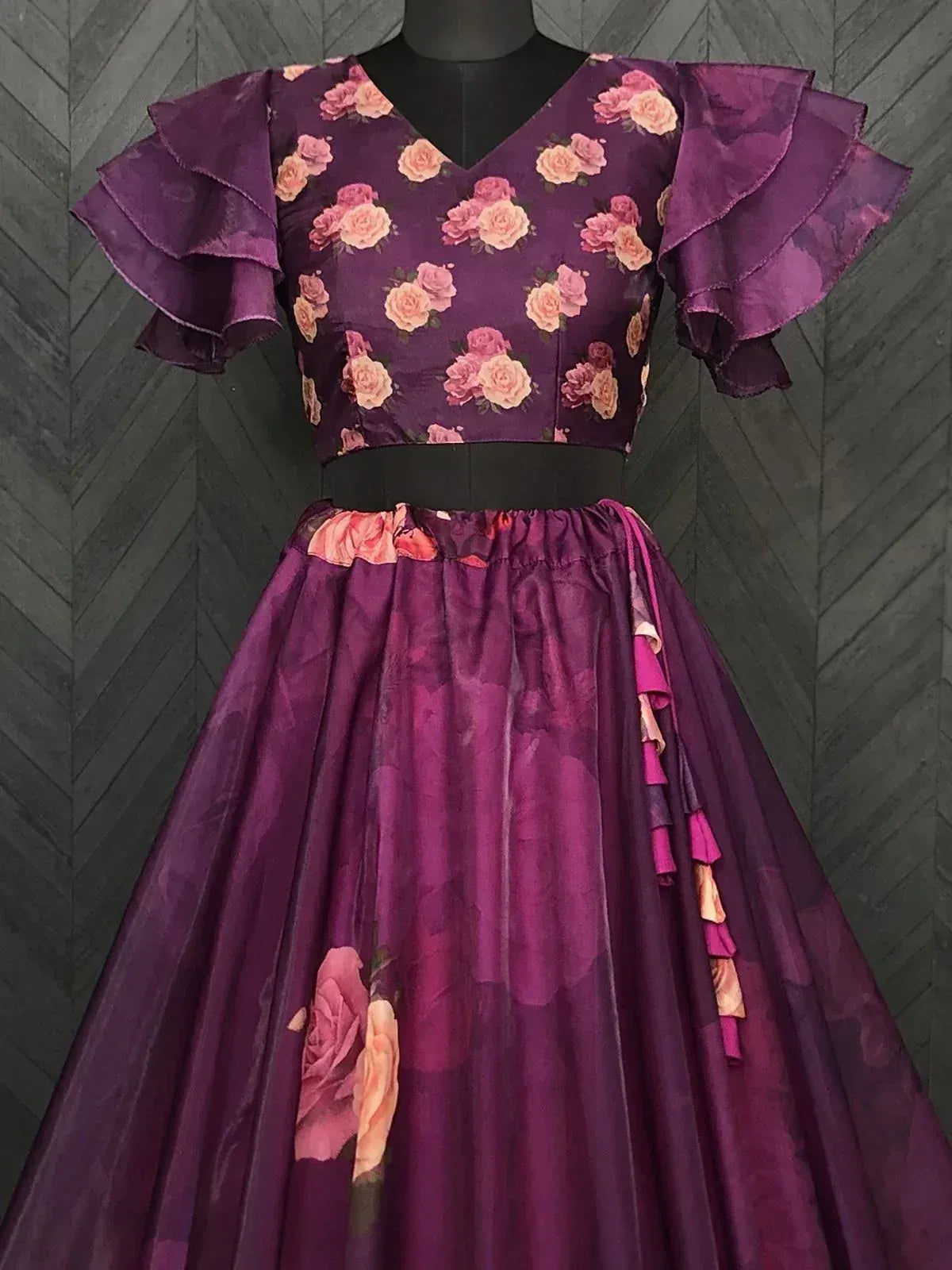 Purple floral print ethnic gown with ruffled sleeves and skirt, perfect for Indian occasions