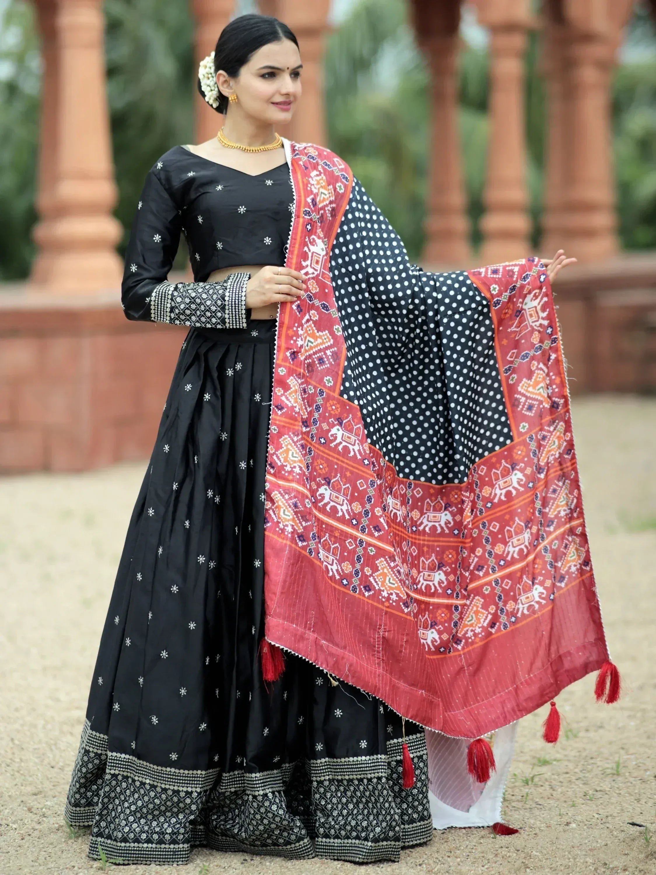 Black embroidered lehenga choli with red and black printed dupatta, Indian ethnic wear