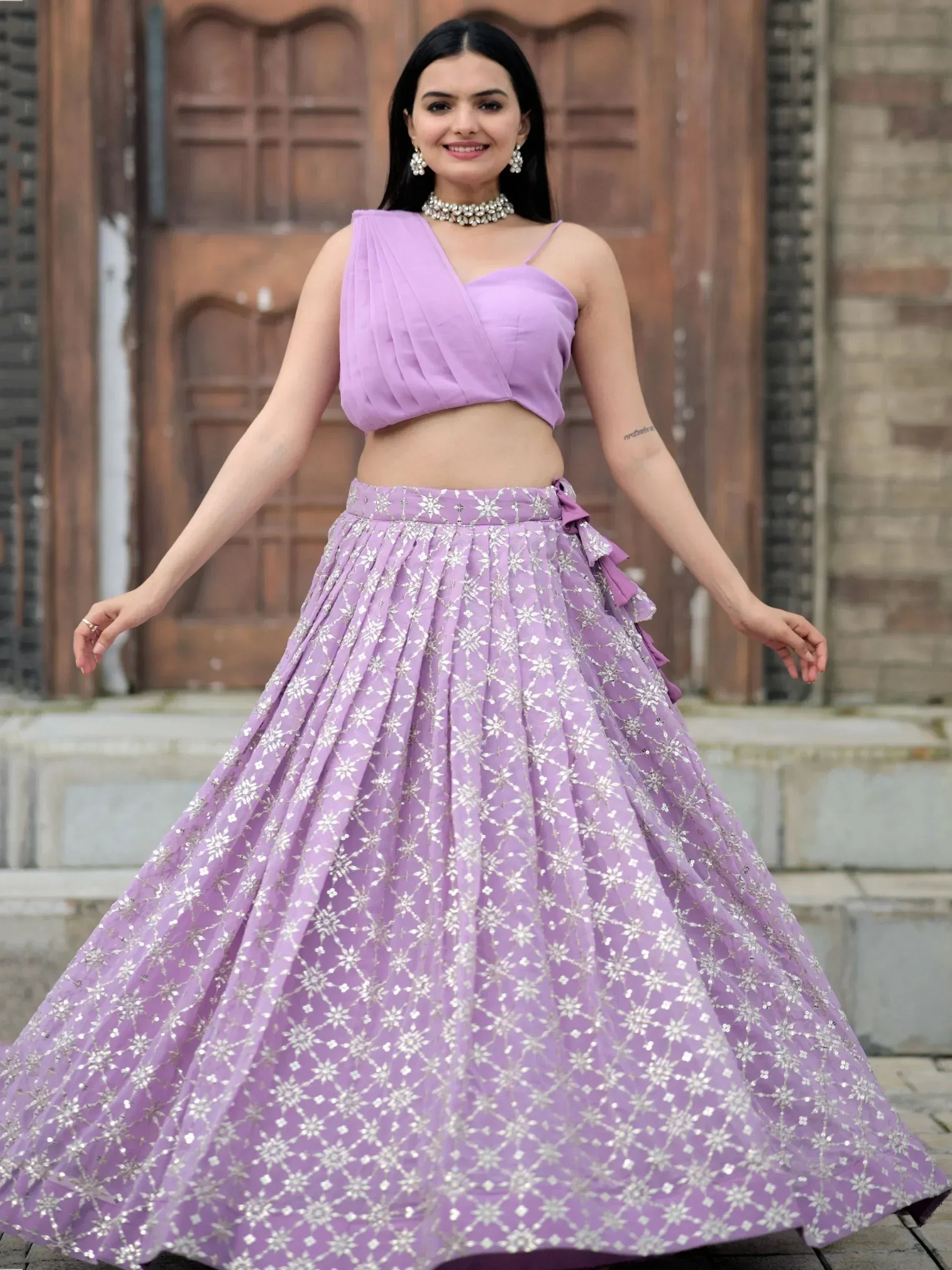Lavender lehenga choli with silver embroidery, perfect for Indian ethnic wear and festive occasions.