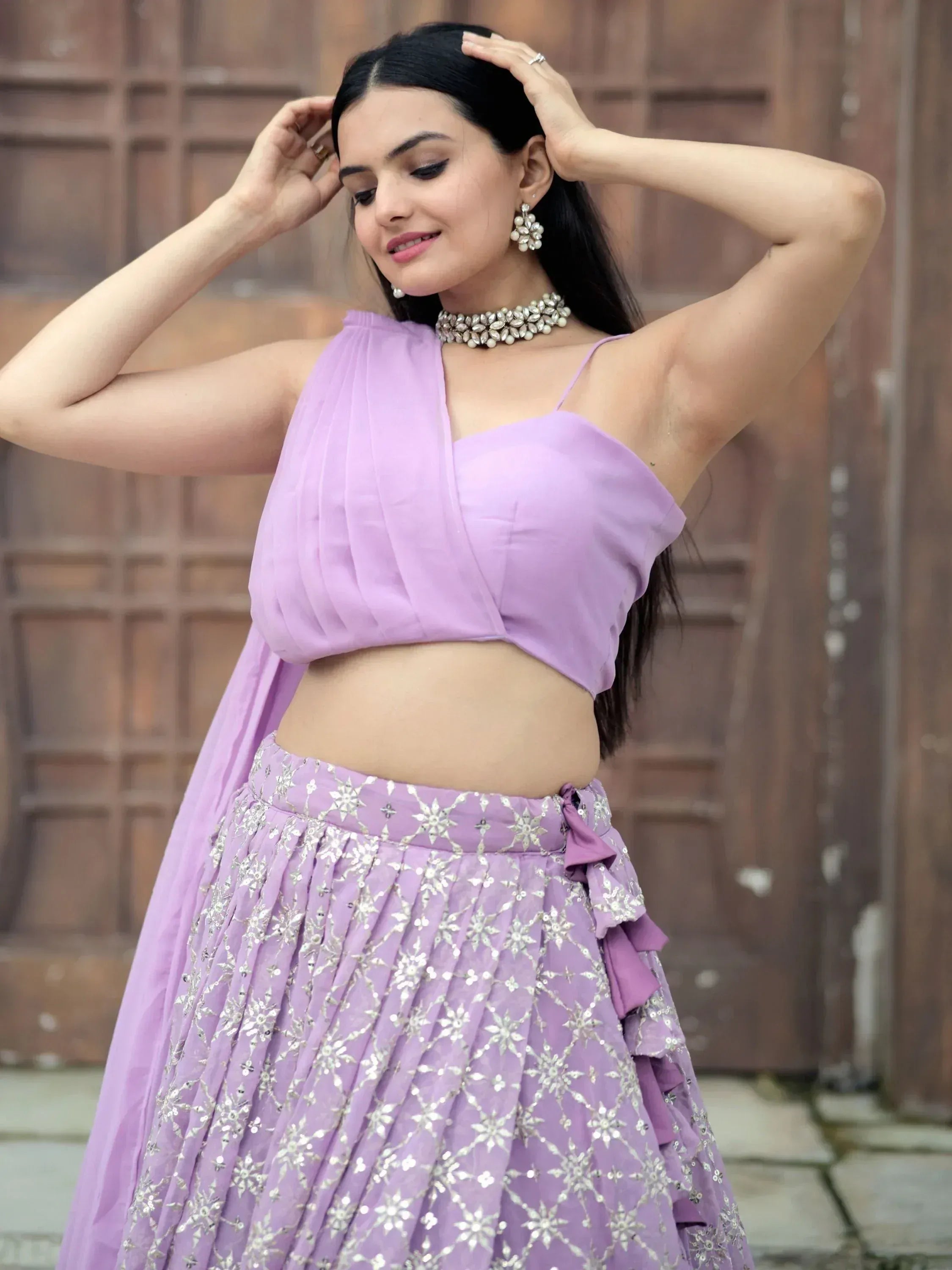 Lavender designer lehenga choli with silver embroidery, perfect for Indian ethnic wear events.
