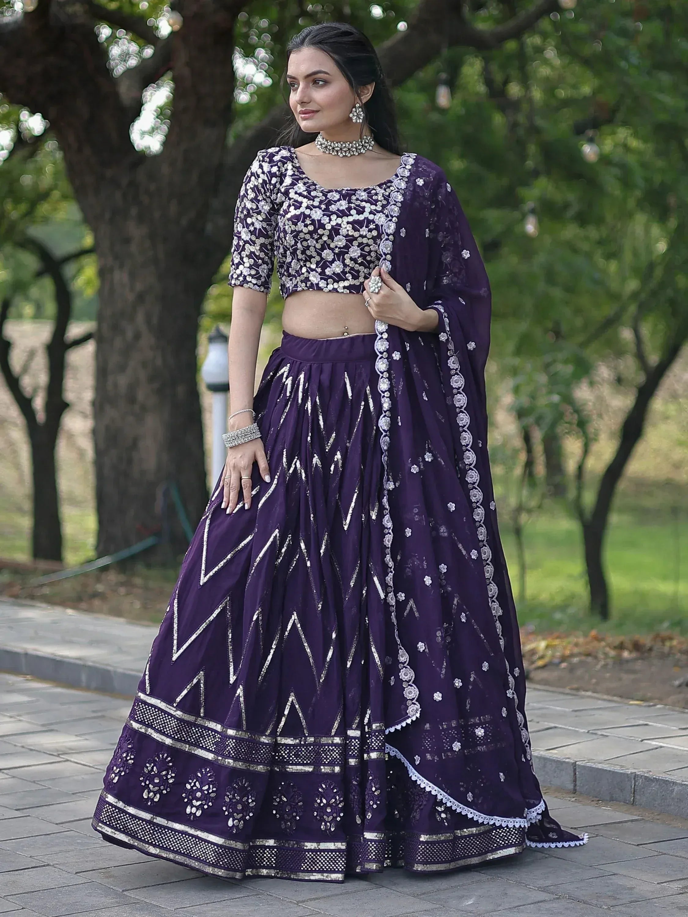 Purple embroidered lehenga choli with floral blouse and dupatta, perfect for Indian ethnic occasions