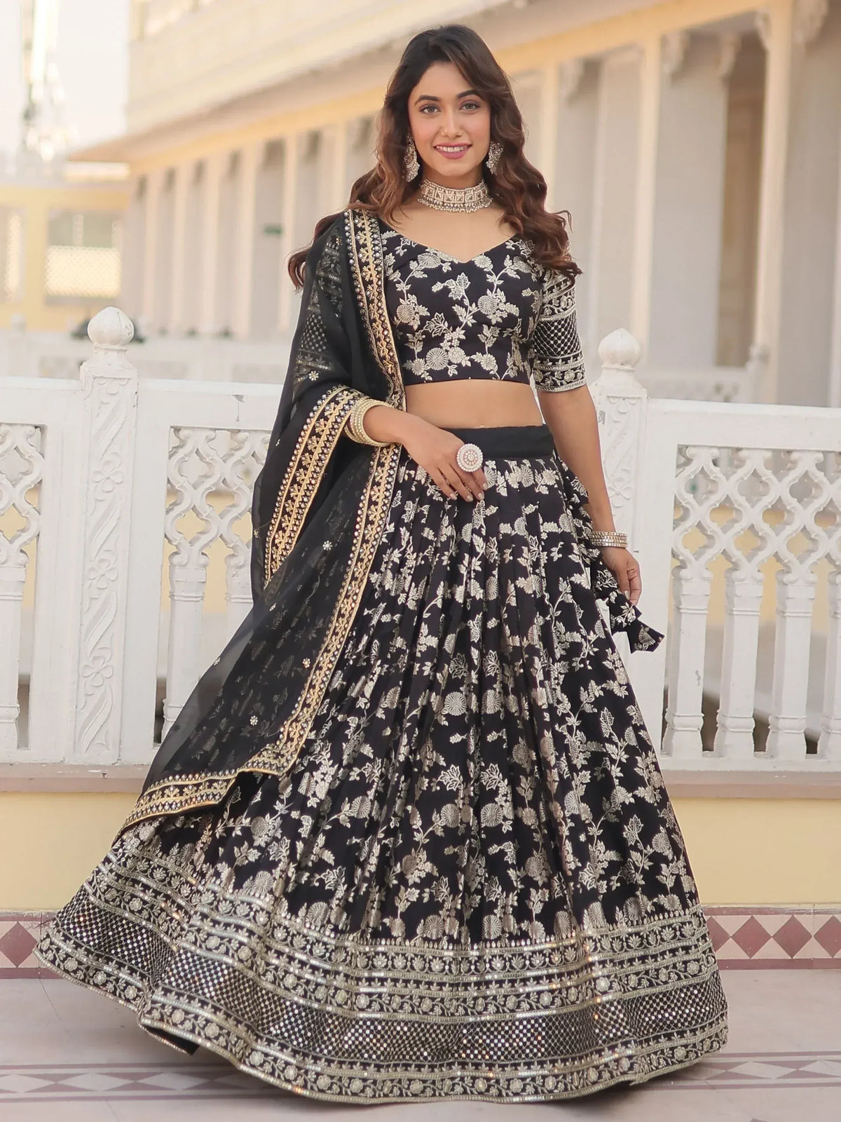 Black and gold floral embroidered lehenga choli with dupatta, perfect for Indian ethnic occasions