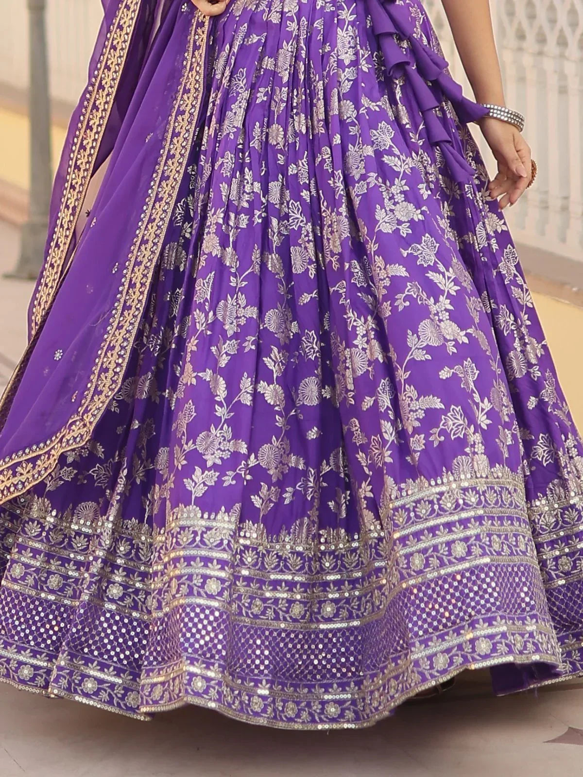 Purple floral embroidered lehenga with gold border and sequin detailing, perfect for Indian ethnic wear