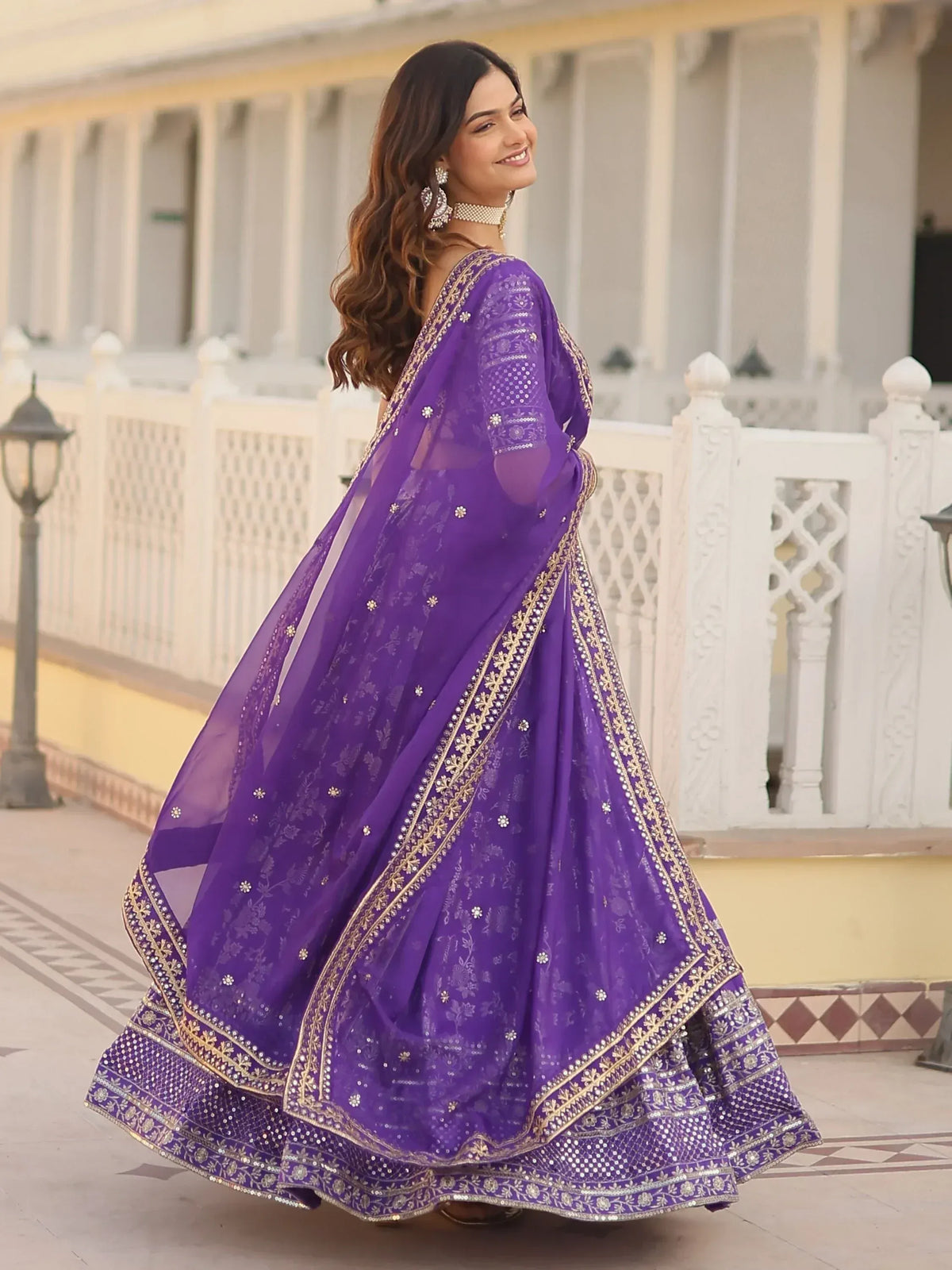 Purple designer lehenga choli with gold embroidery and sequins, perfect for Indian ethnic wear occasions