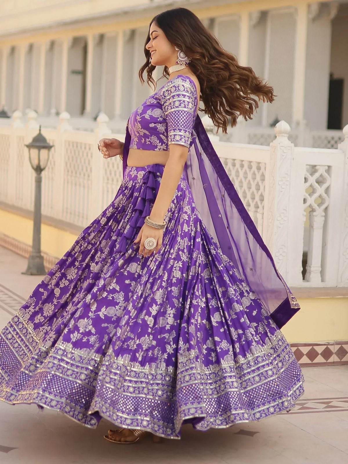 Purple floral lehenga choli with silver embroidery, perfect for Indian ethnic wear and festive occasions.