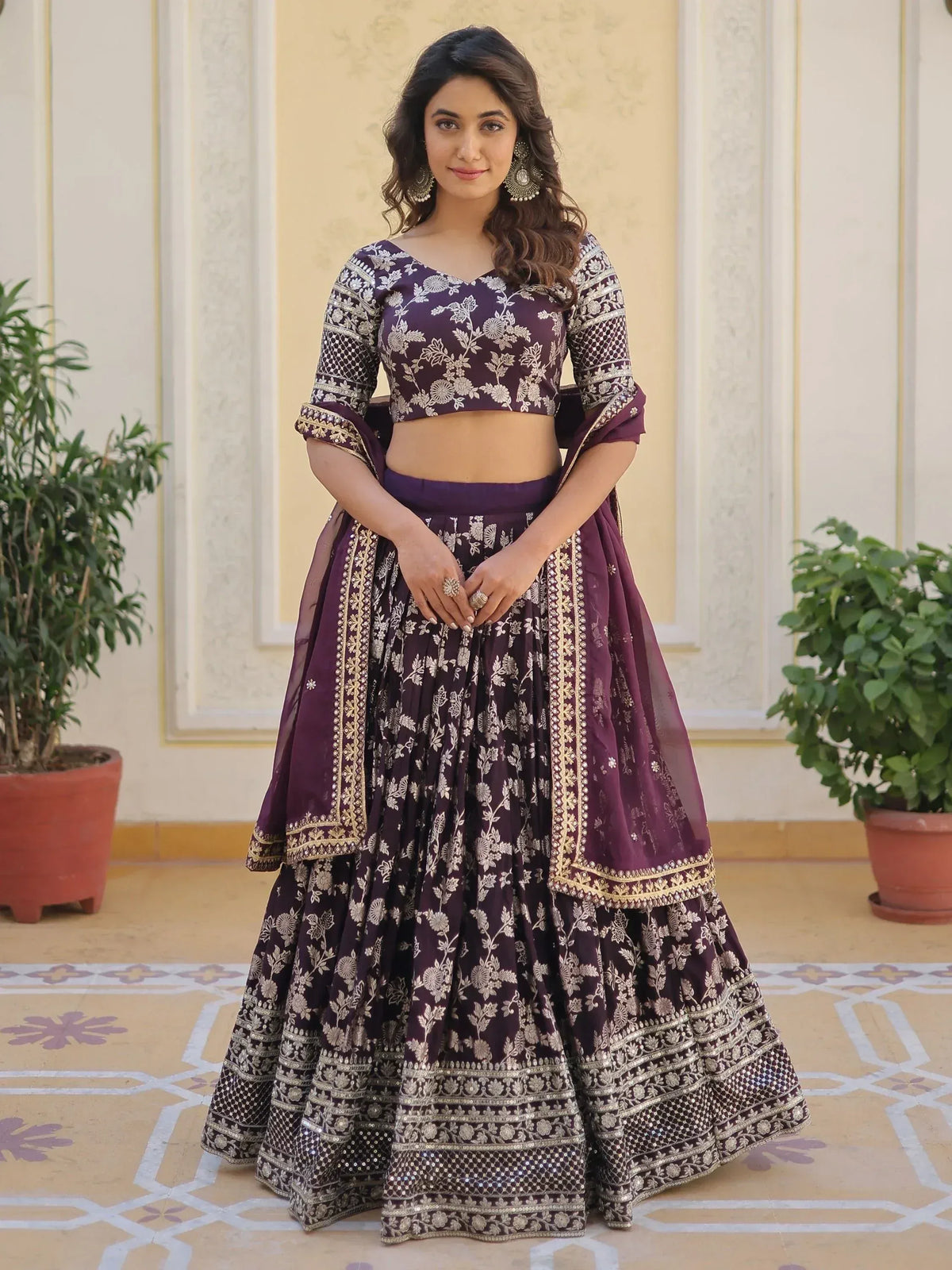 Purple floral embroidered lehenga choli with gold detailing, perfect for Indian ethnic wear occasions