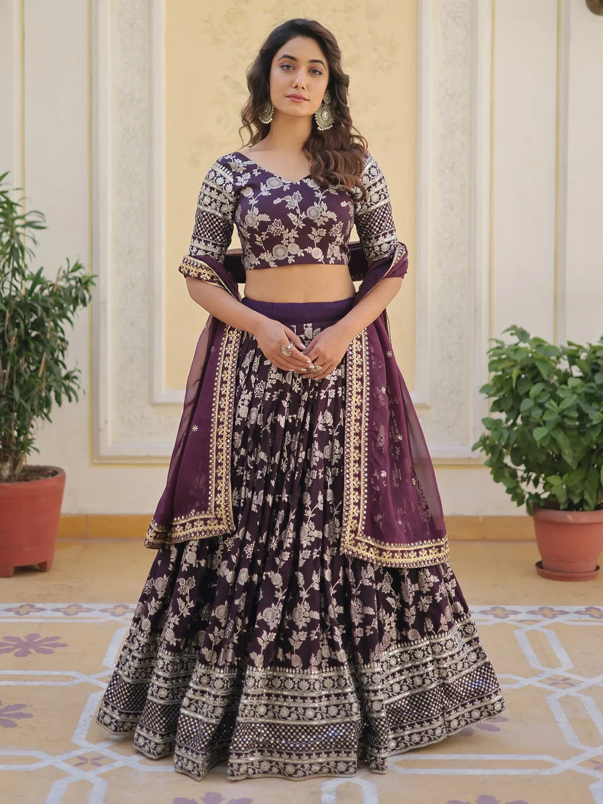 Purple floral embroidered lehenga choli with gold detailing, perfect for Indian ethnic wear occasions.
