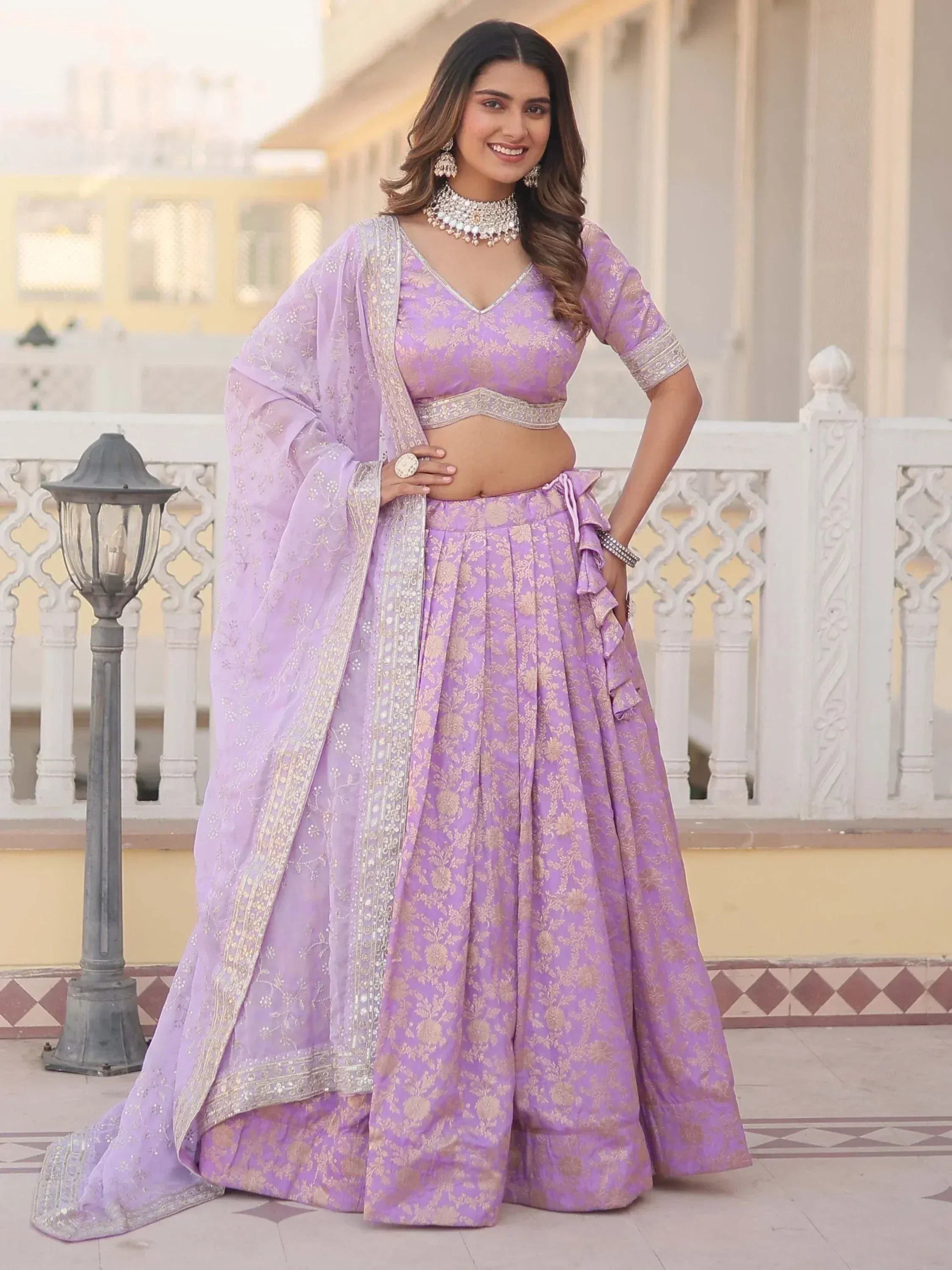 Lavender designer lehenga choli with gold floral print, perfect for Indian ethnic wear events