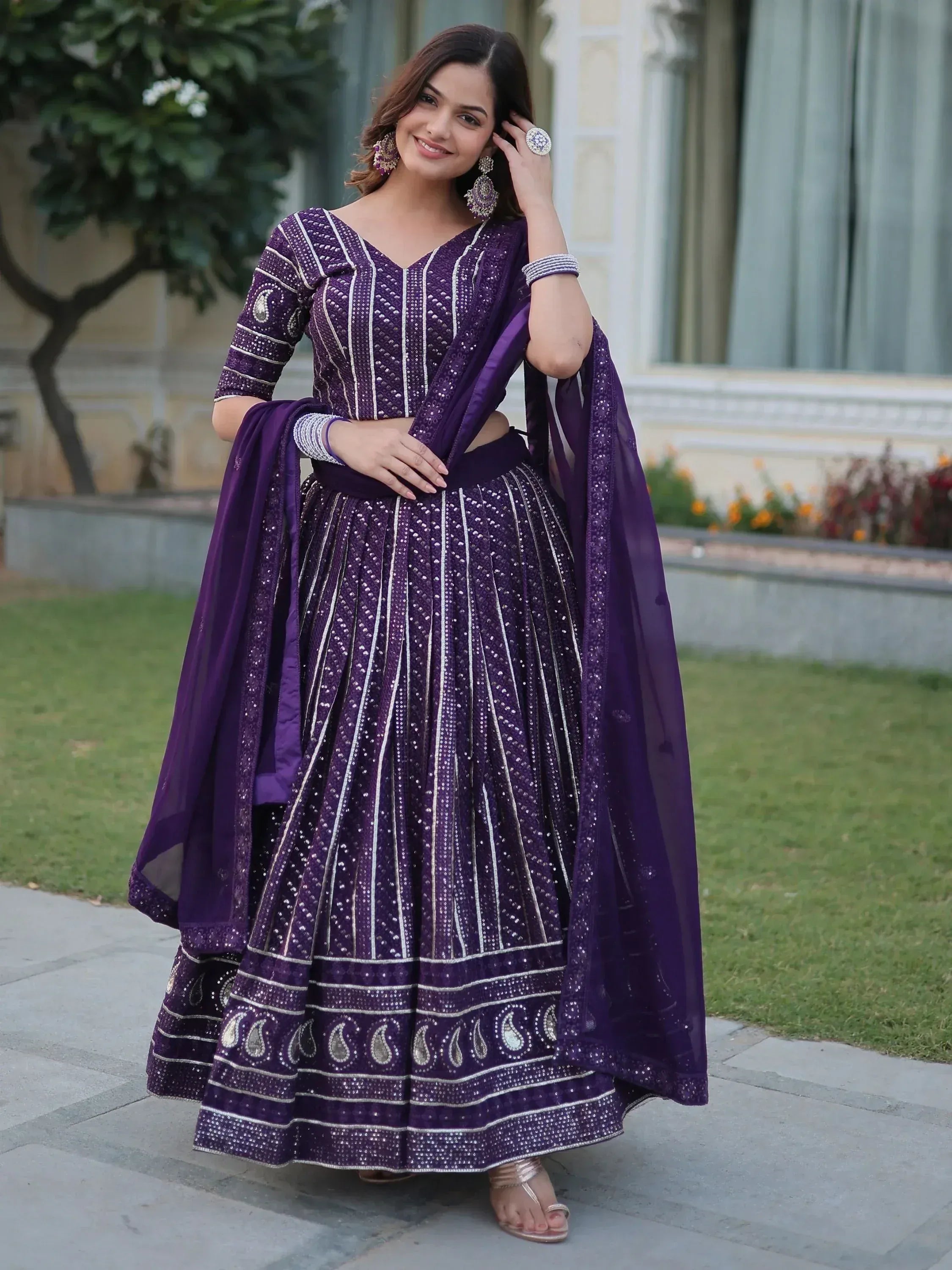 Purple designer lehenga choli with silver embroidery, perfect for Indian ethnic wear events