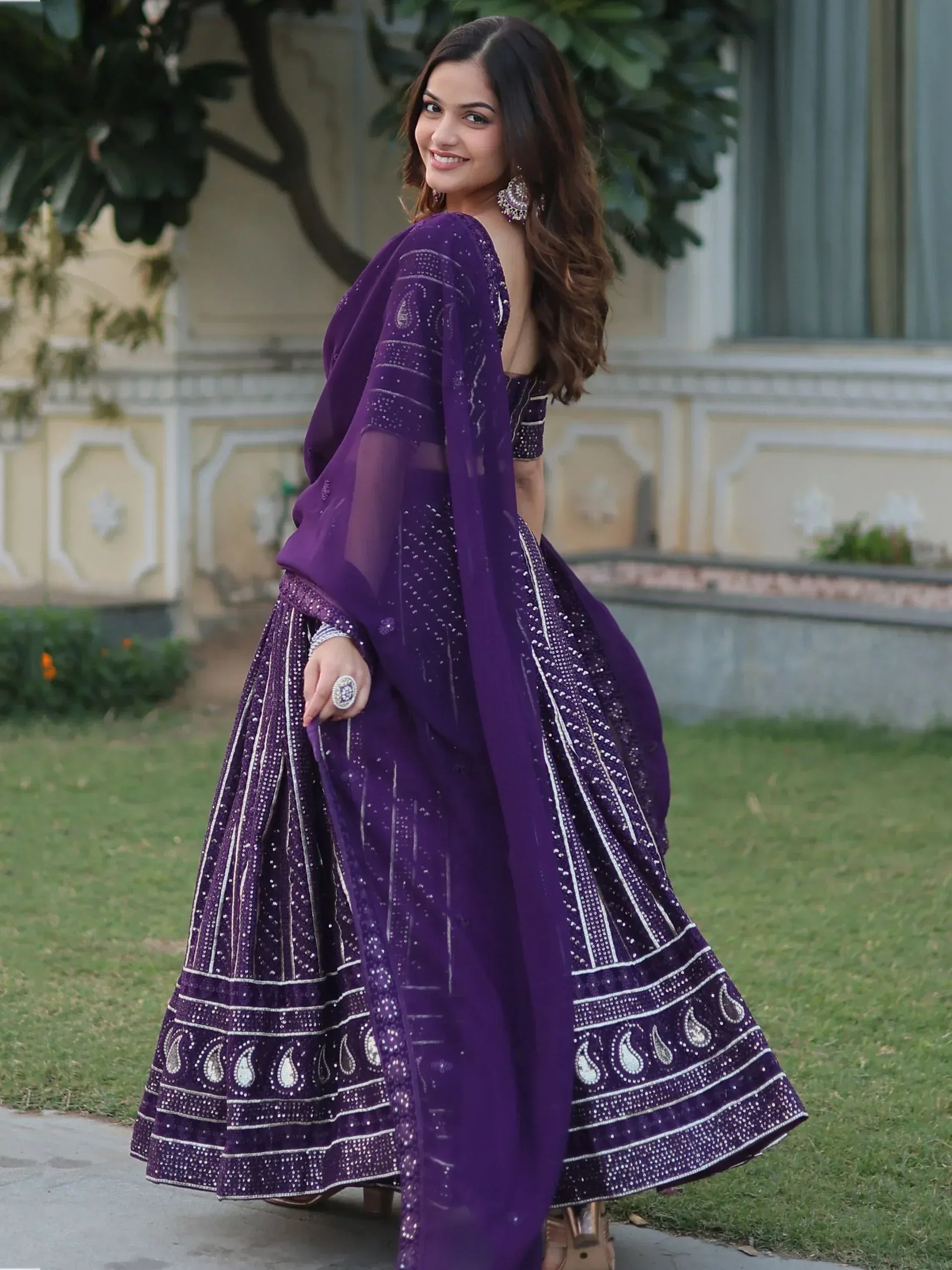 Purple designer lehenga choli with silver embroidery, perfect for Indian ethnic wear events
