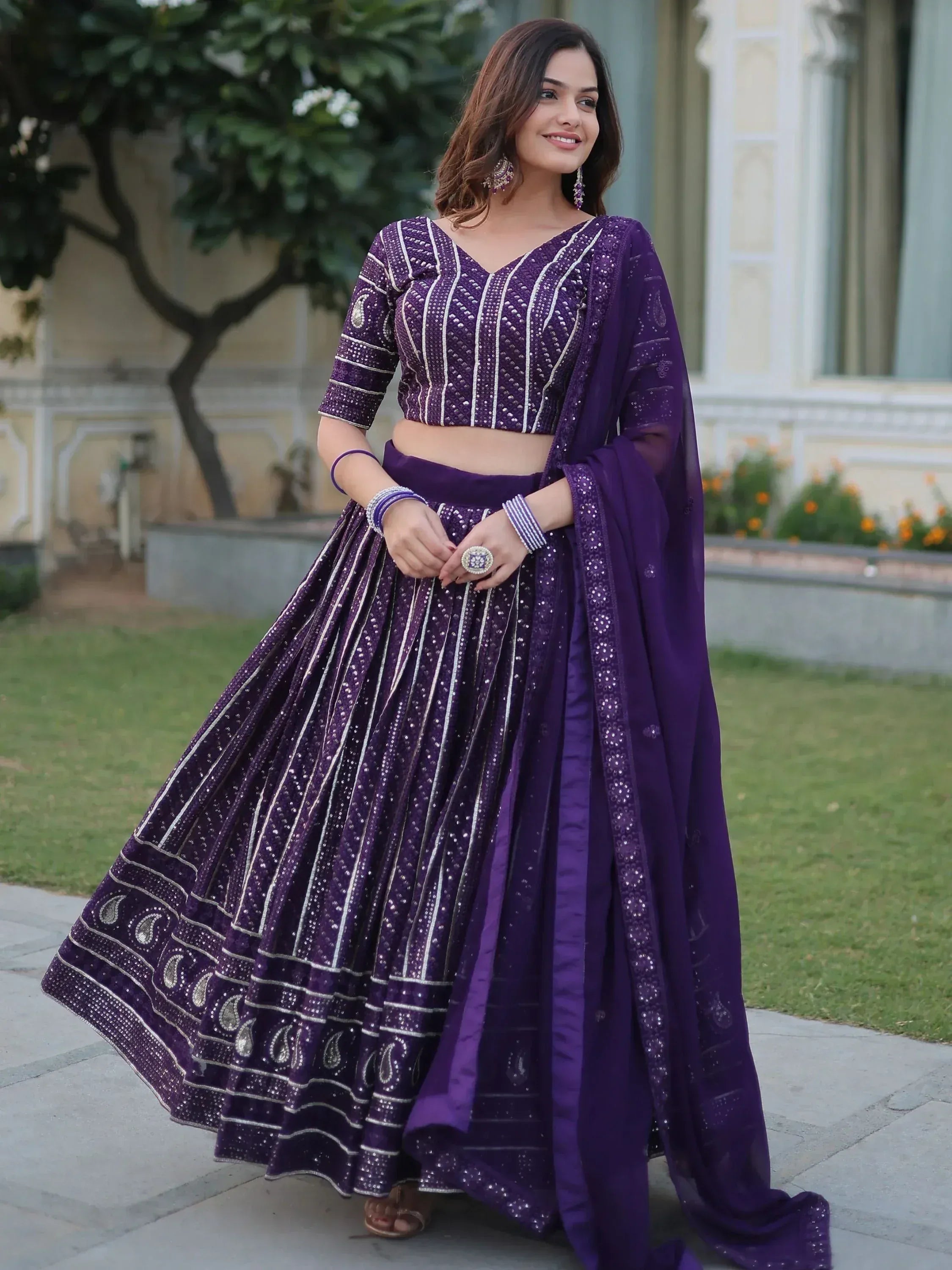 Purple designer lehenga choli with silver embroidery, perfect for Indian ethnic wear occasions