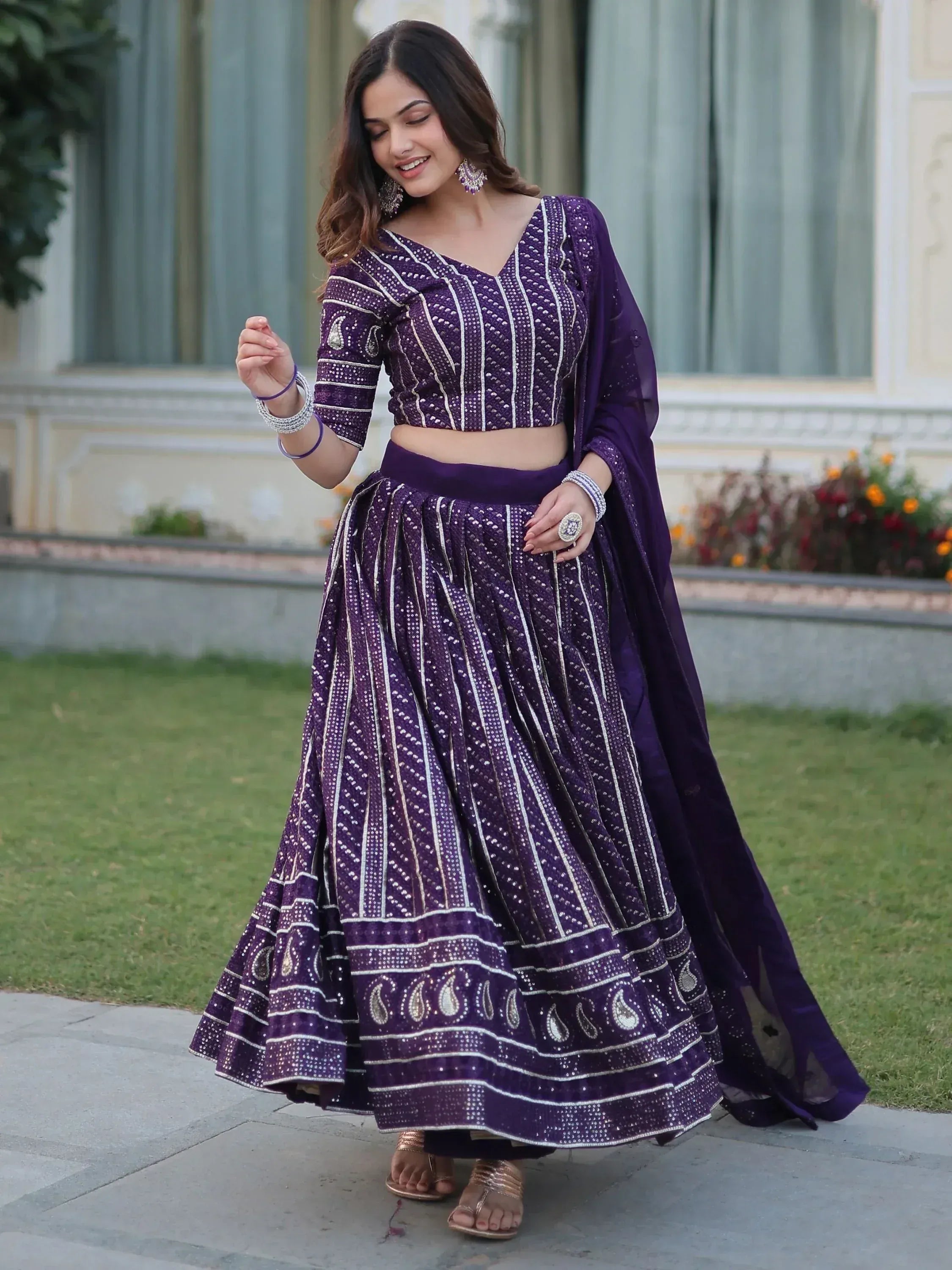 Purple embroidered lehenga choli with silver detailing, perfect for Indian ethnic wear occasions