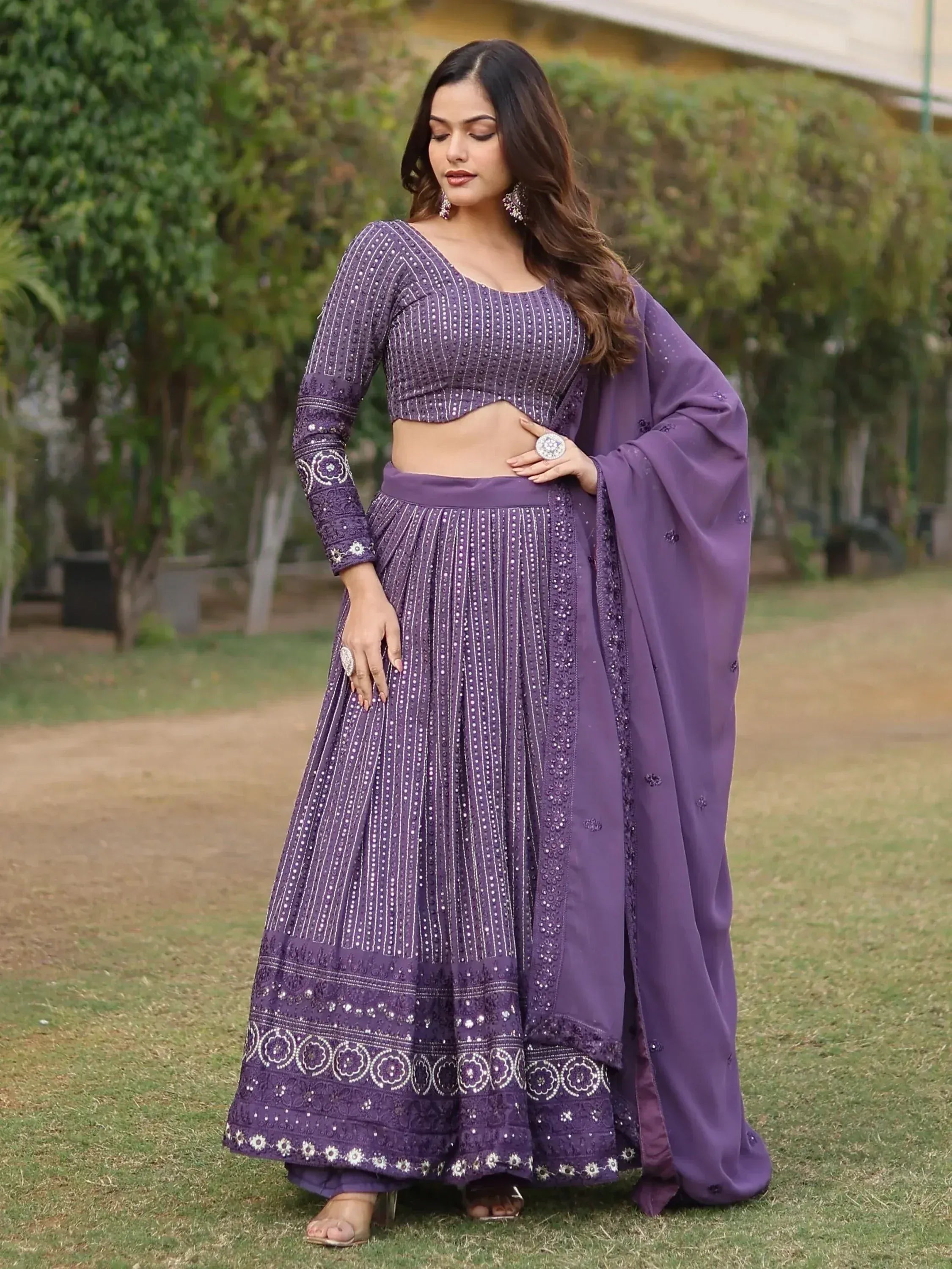 Purple embroidered lehenga choli with mirror work, perfect for Indian ethnic occasions