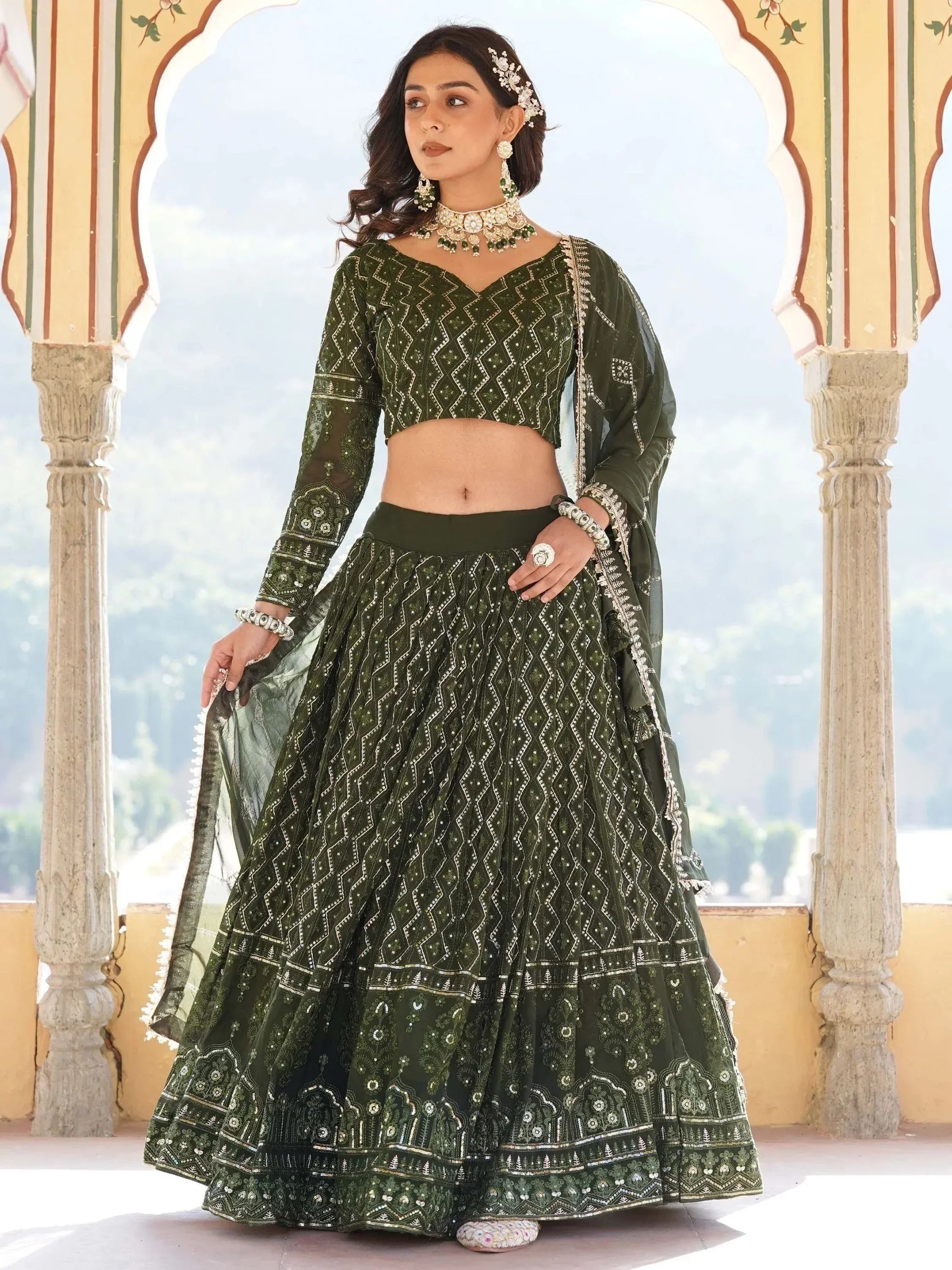 Olive green embroidered lehenga choli with geometric patterns, perfect for Indian ethnic wear events.