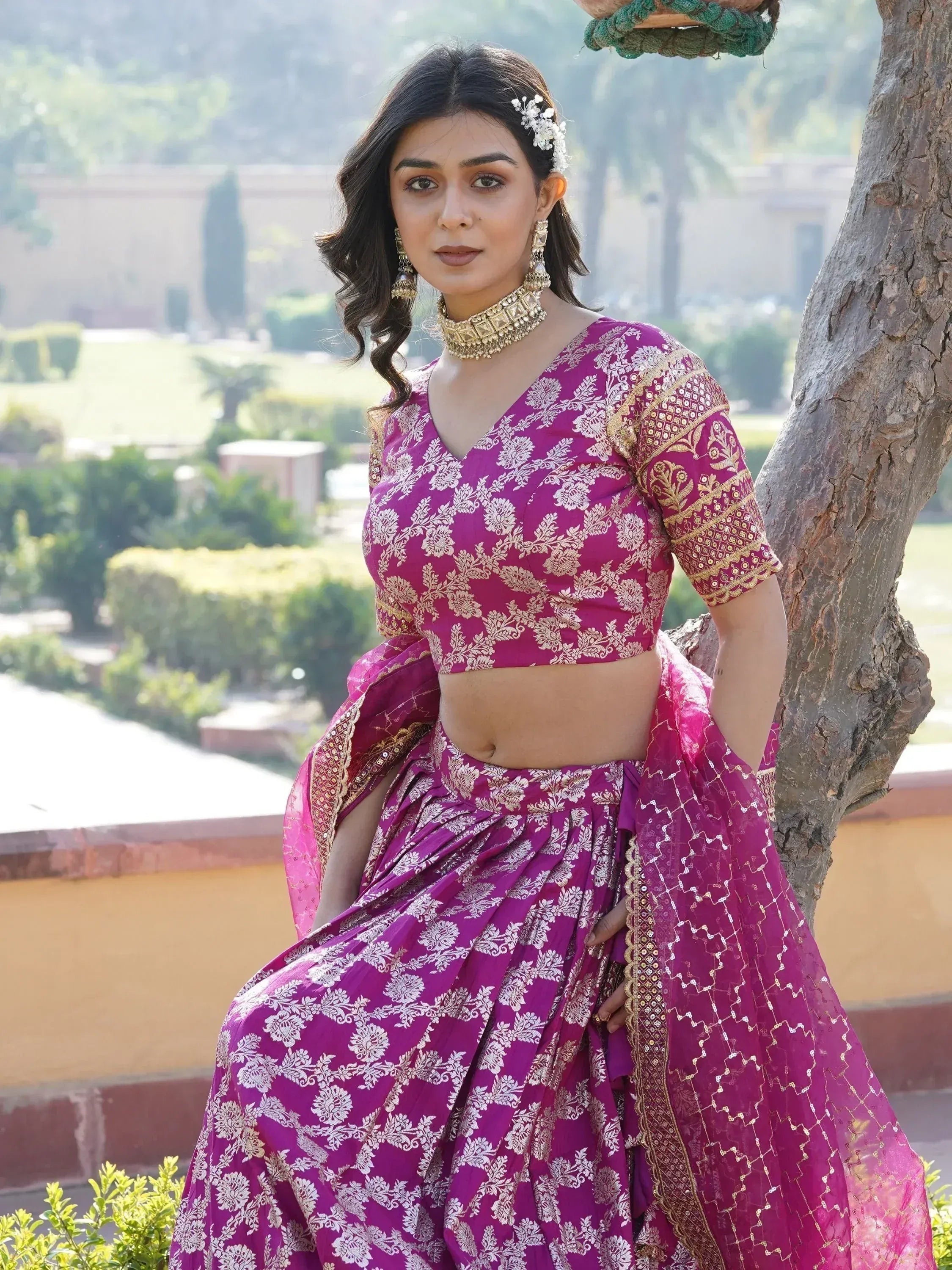 Purple floral lehenga choli with gold embroidery, perfect for Indian ethnic wear and festive occasions.