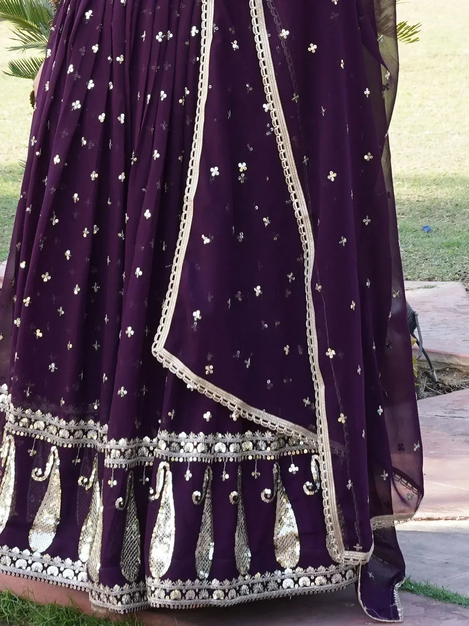Purple lehenga choli with gold embroidery and sequin detailing, perfect for Indian ethnic wear occasions