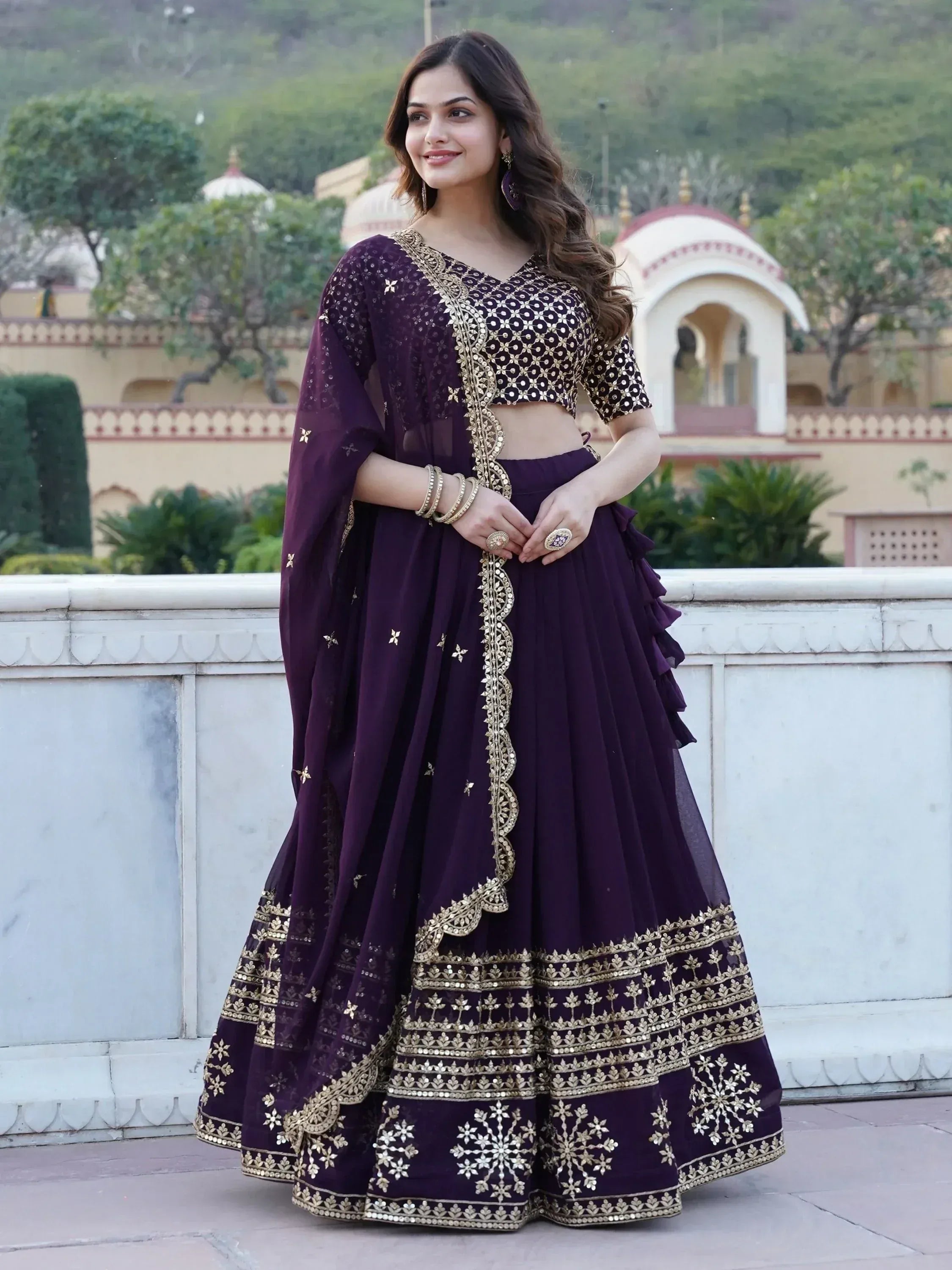 Purple designer lehenga choli with gold embroidery, perfect for Indian ethnic wear occasions