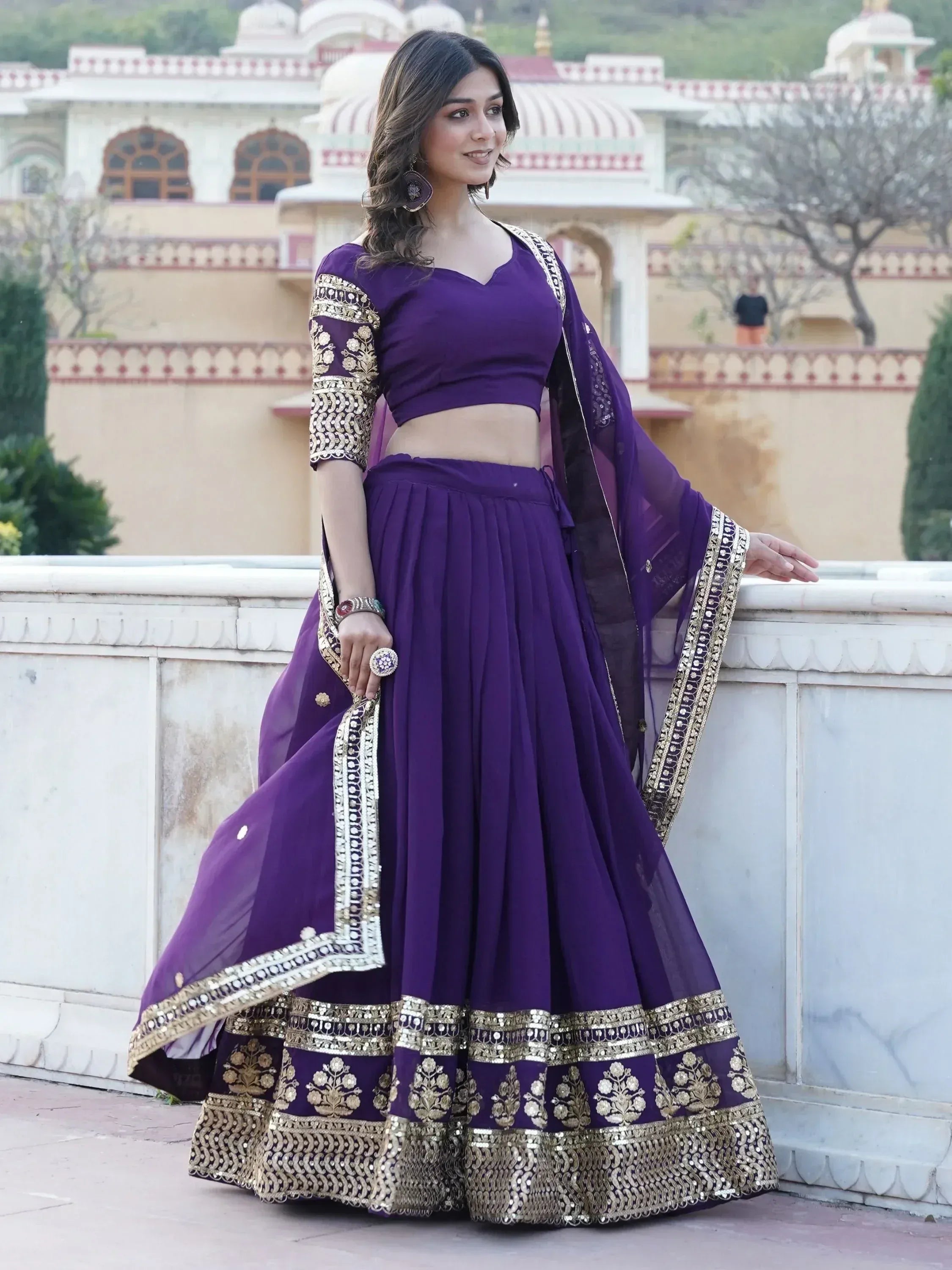 Purple designer lehenga choli with gold embroidery, perfect for Indian ethnic wear occasions