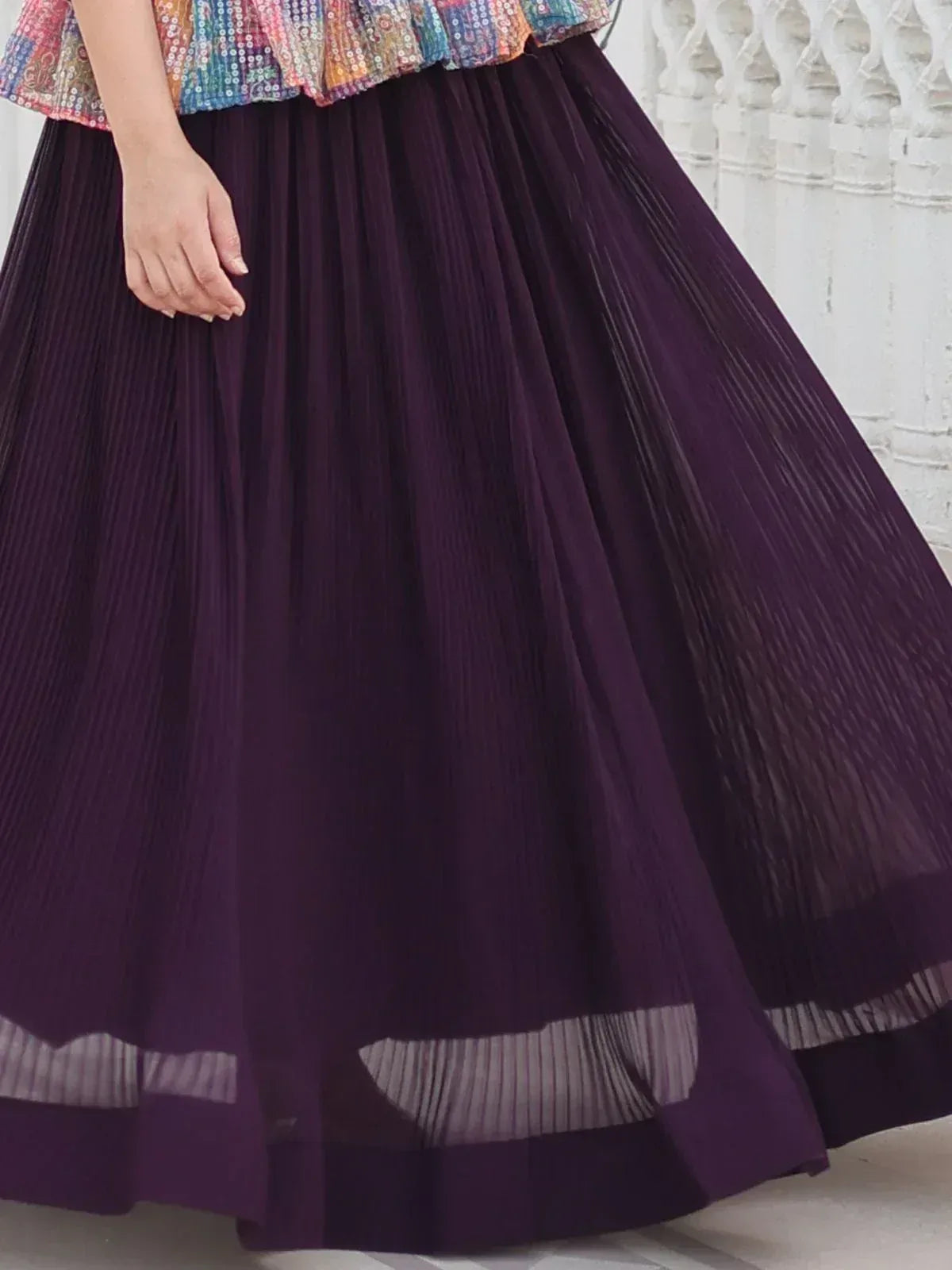 Purple pleated ethnic skirt with colorful sequin top, perfect for Indian festive wear
