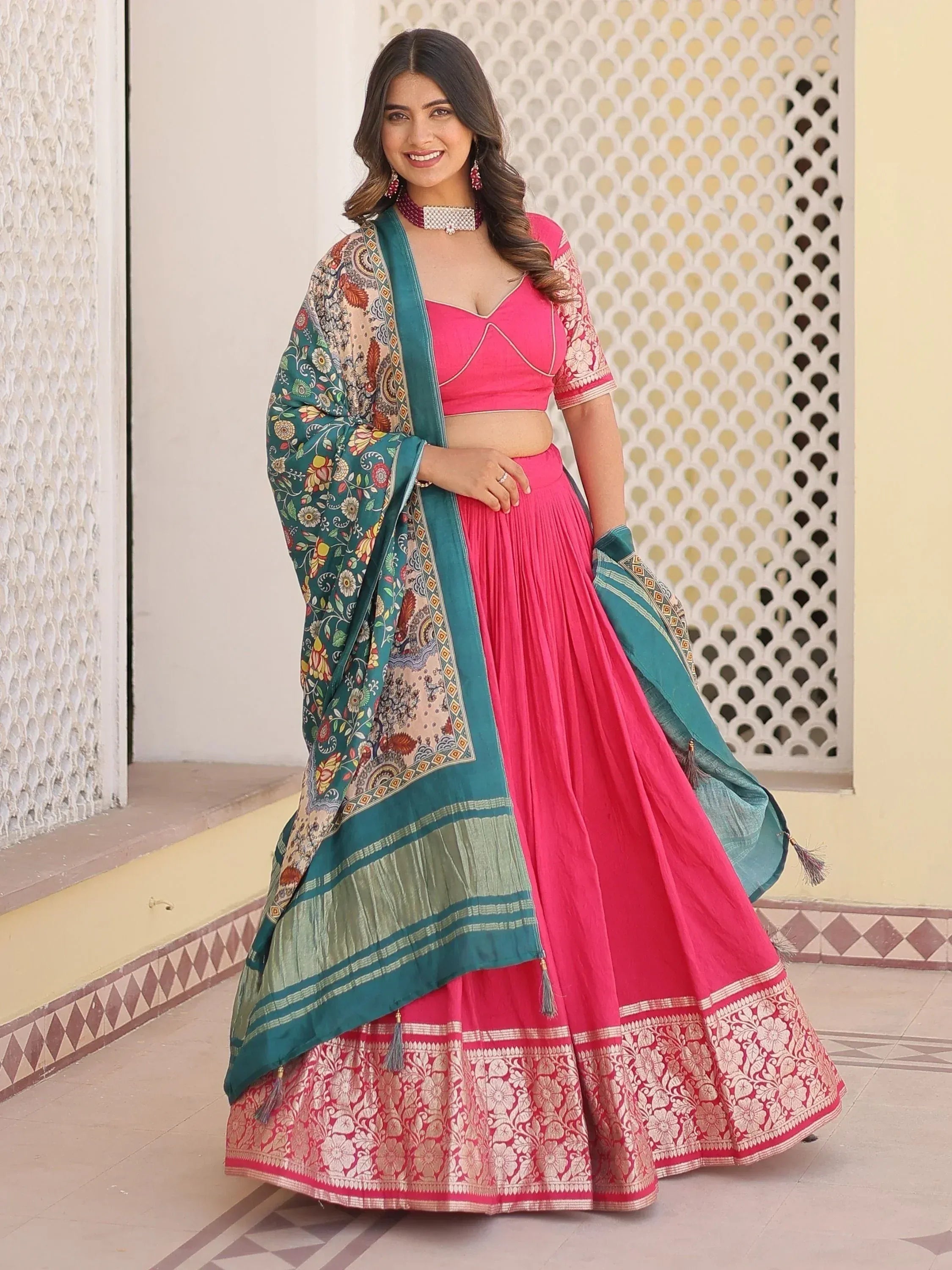 Pink lehenga choli with floral dupatta, ethnic Indian wear for festive occasions