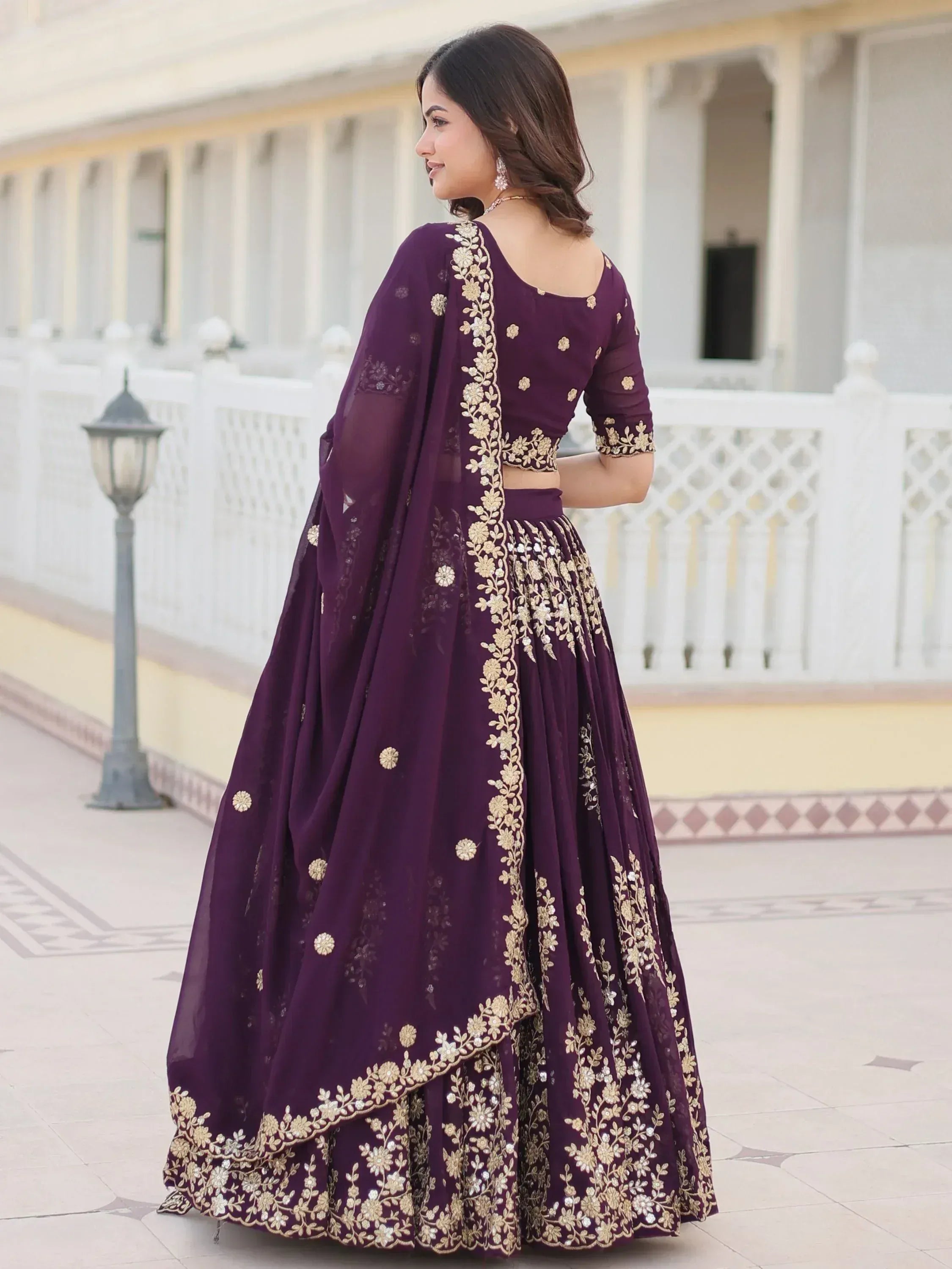 Purple designer lehenga choli with gold floral embroidery, perfect for Indian ethnic wear occasions