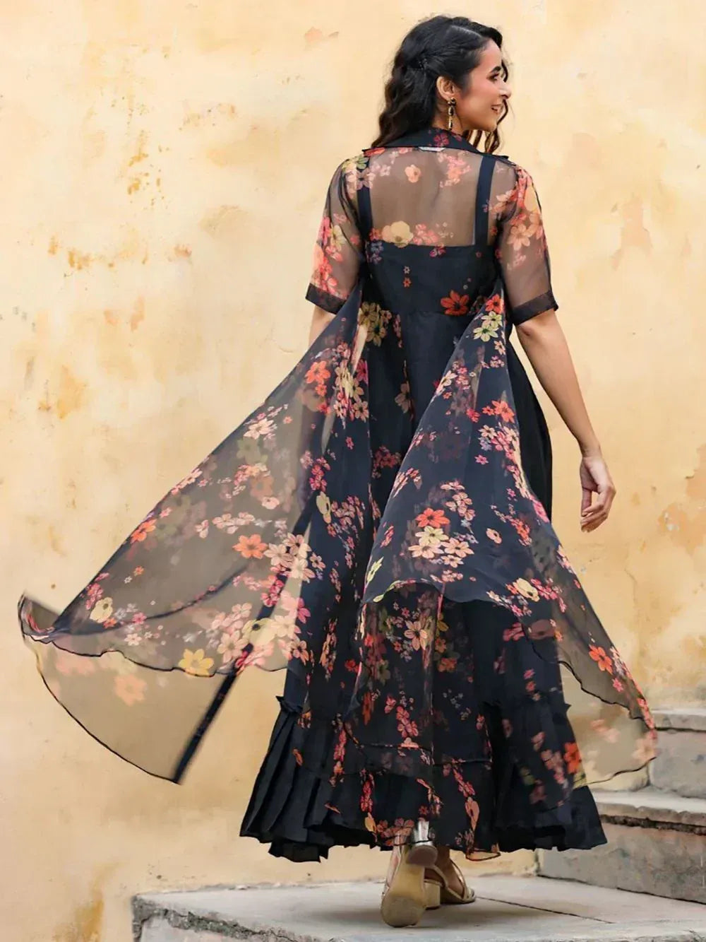 Black floral ethnic gown with sheer overlay, perfect for Indian occasions and festive wear.