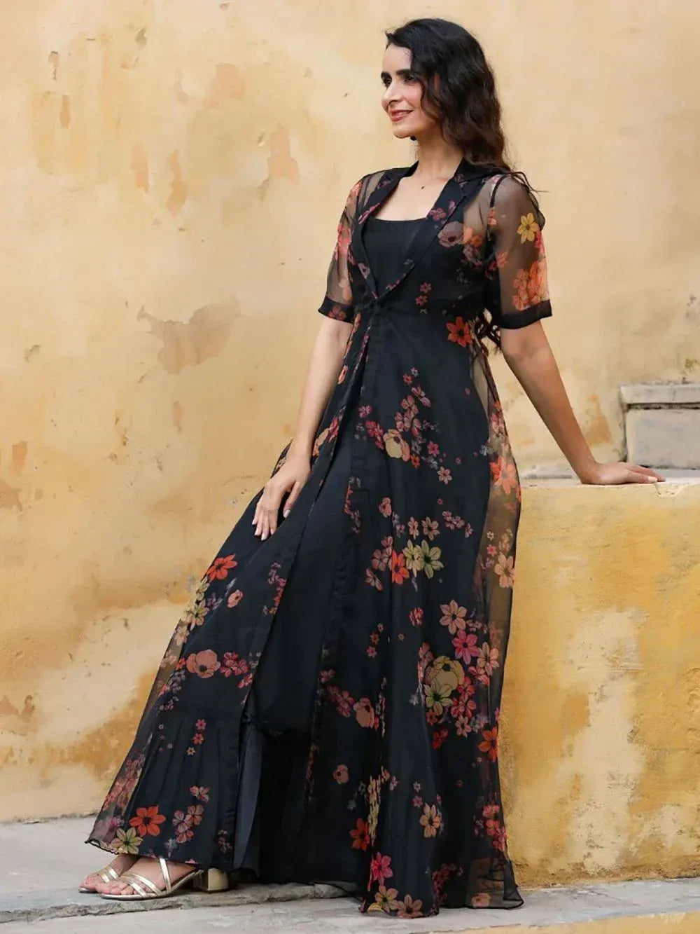 Black floral ethnic gown with sheer sleeves, perfect for Indian occasions and festive wear