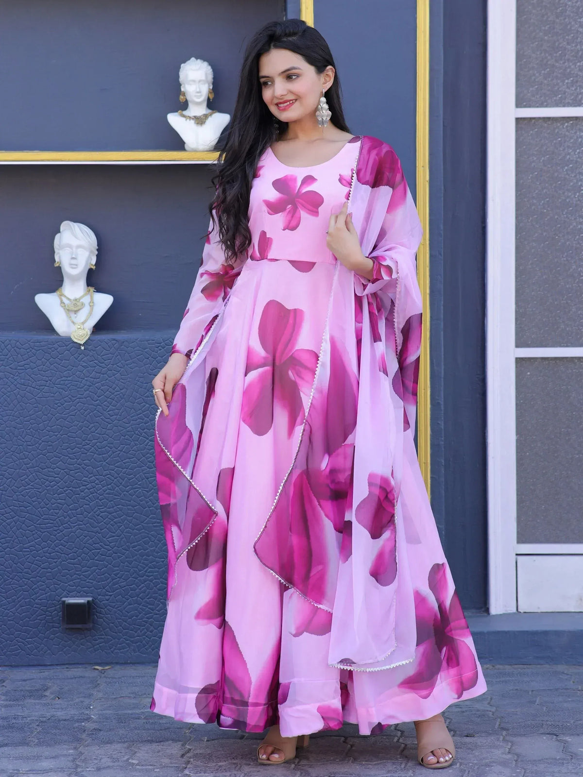 Pink floral print ethnic gown with matching dupatta, perfect for Indian occasions and parties