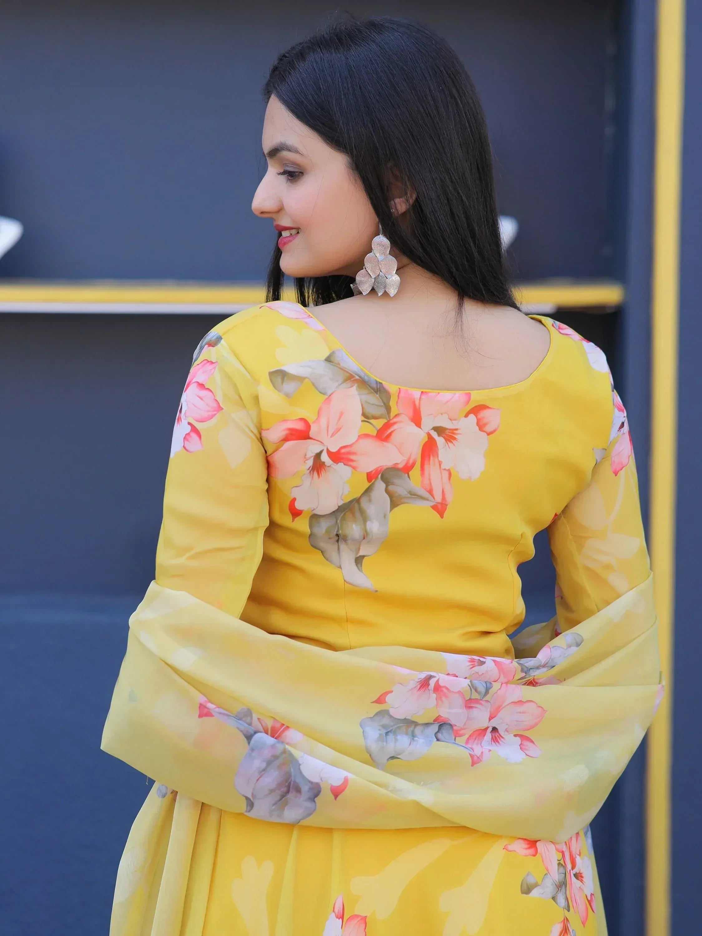 Yellow floral print ethnic gown with bell sleeves, perfect for Indian occasions