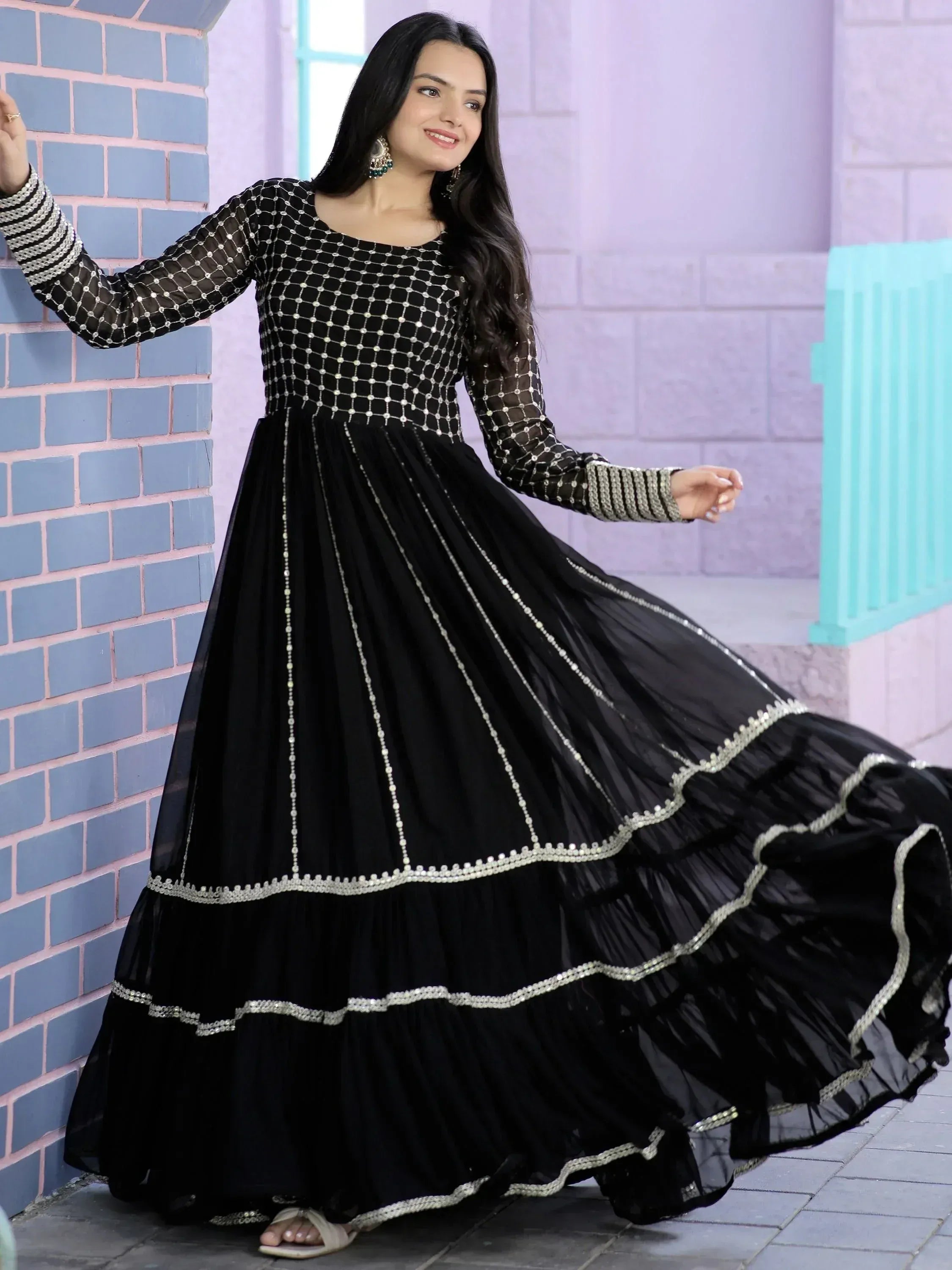 Black ethnic gown with silver embroidery, long sleeves, and flared skirt for women