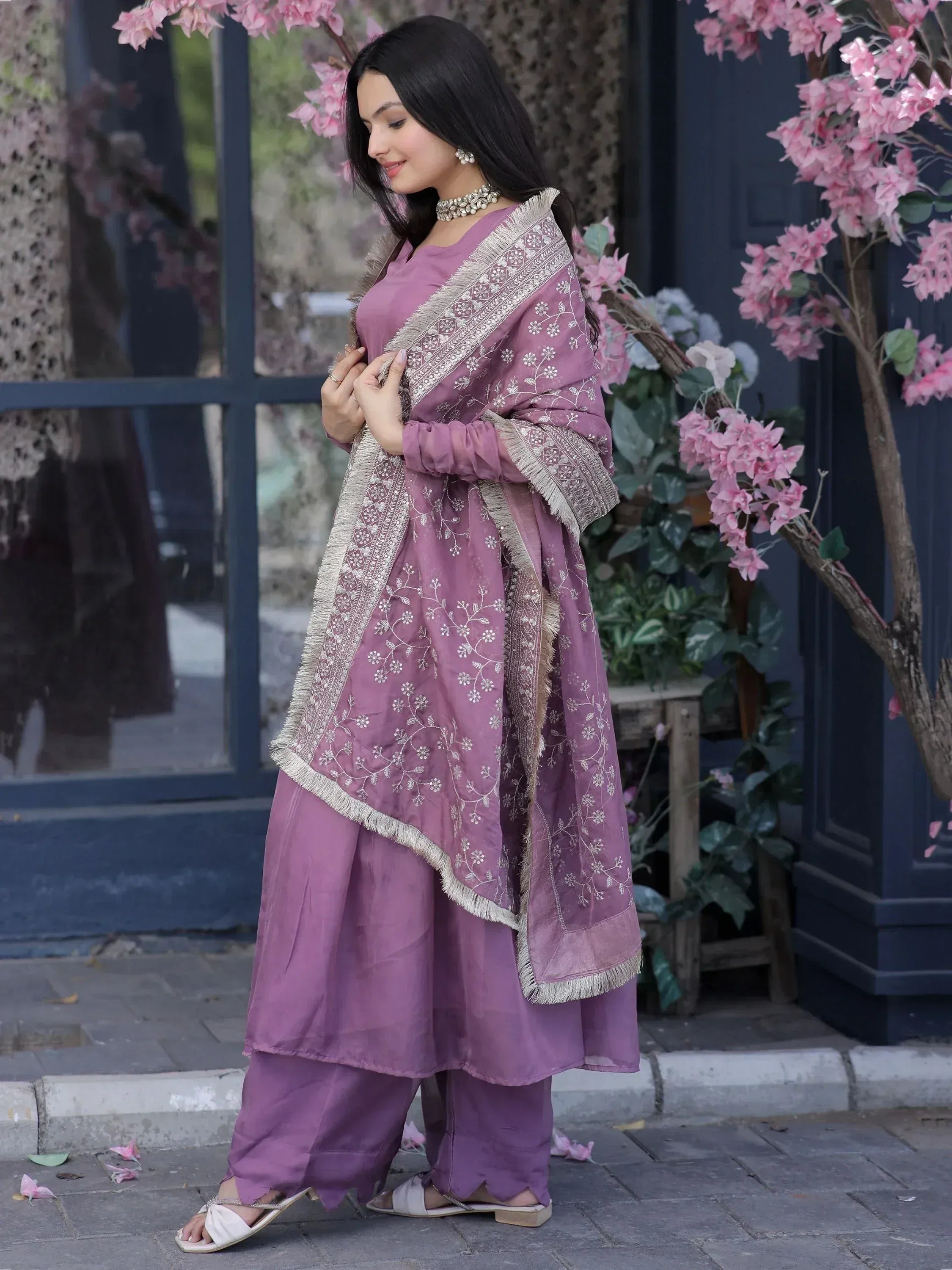 Purple embroidered salwar kameez with floral dupatta, perfect for Indian ethnic wear occasions.