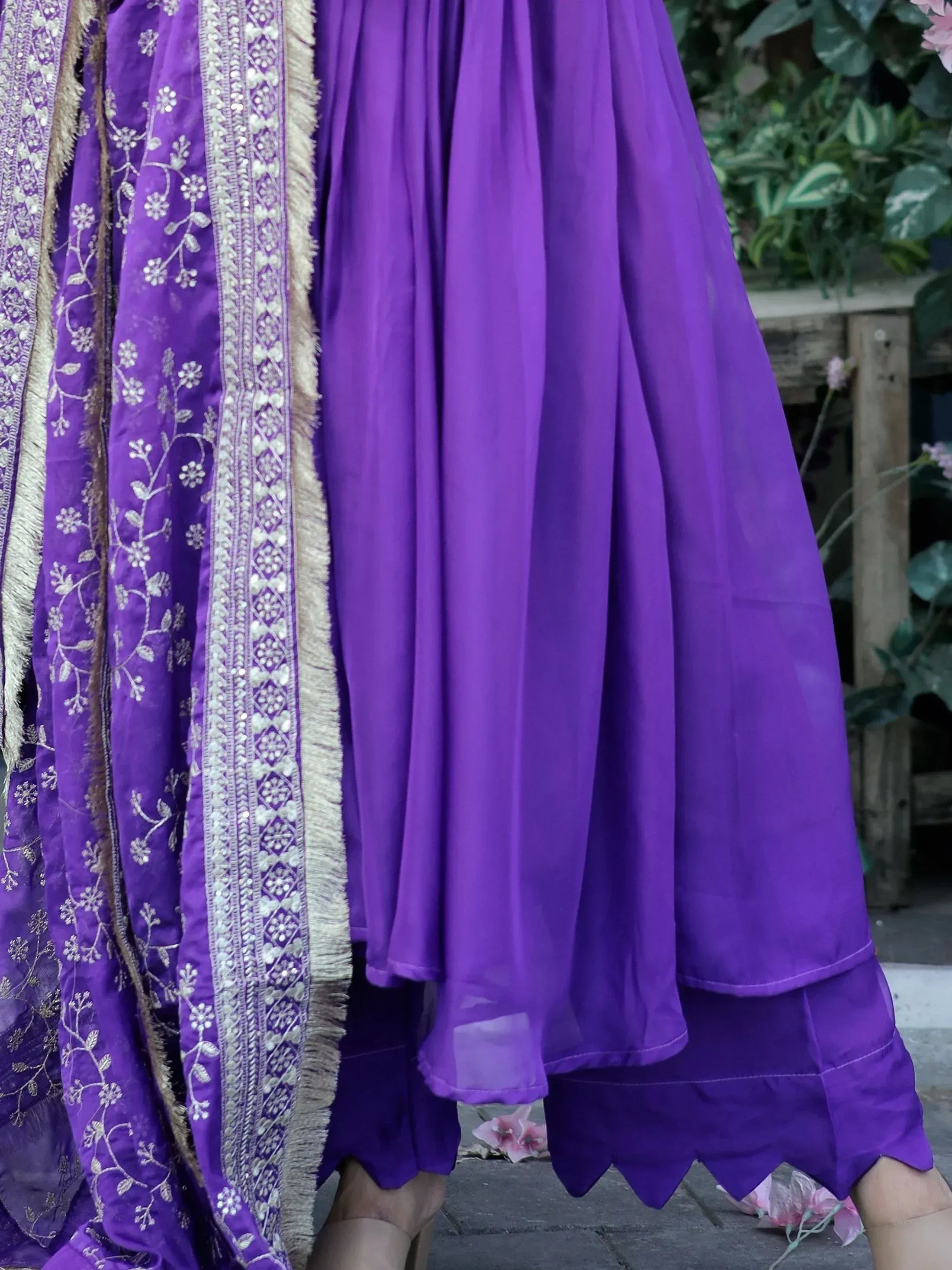 Purple ethnic lehenga with floral embroidery and sheer dupatta, perfect for Indian weddings and festivals