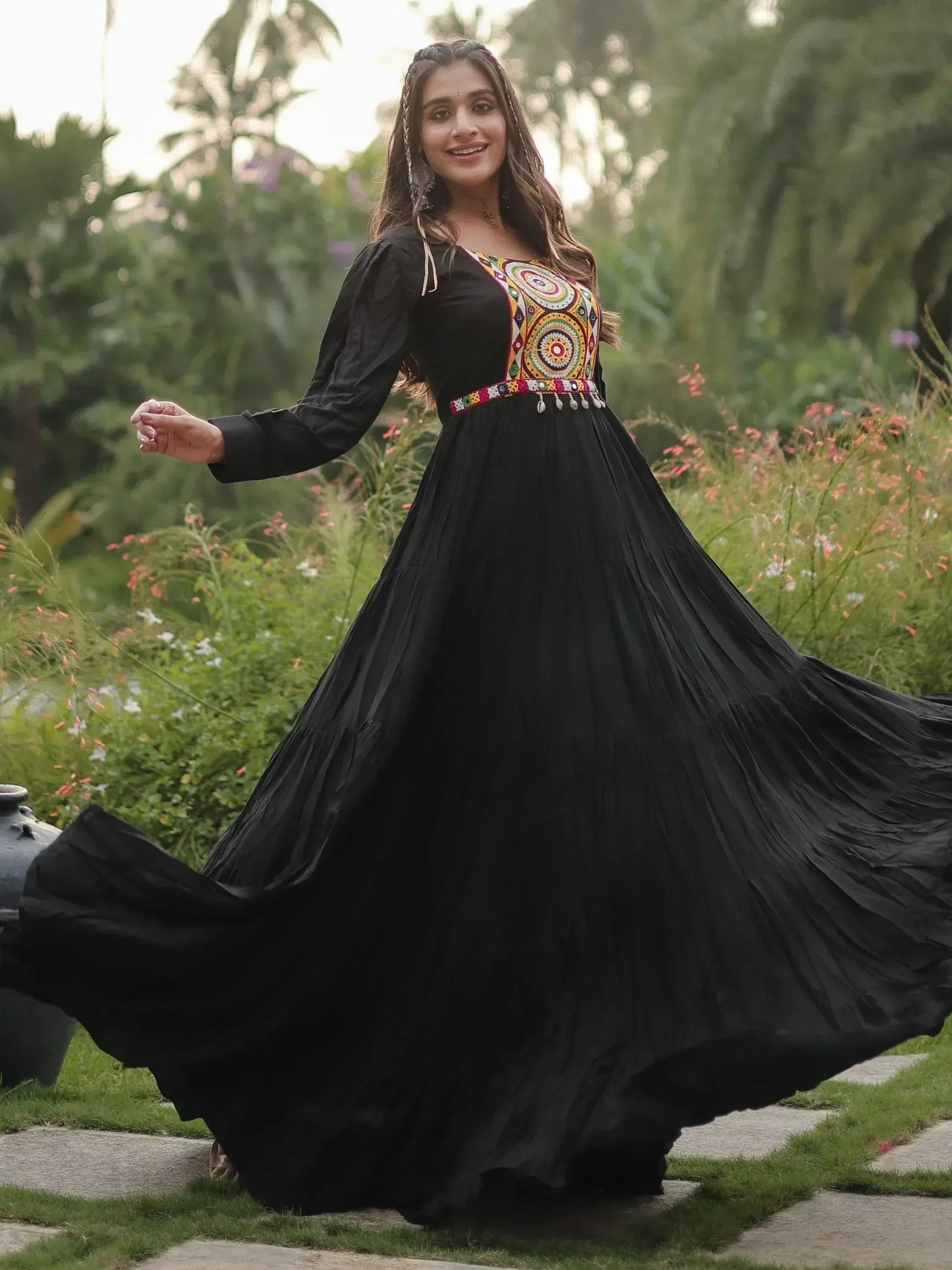 Black ethnic gown with colorful embroidery, perfect for Indian occasions and festive wear.