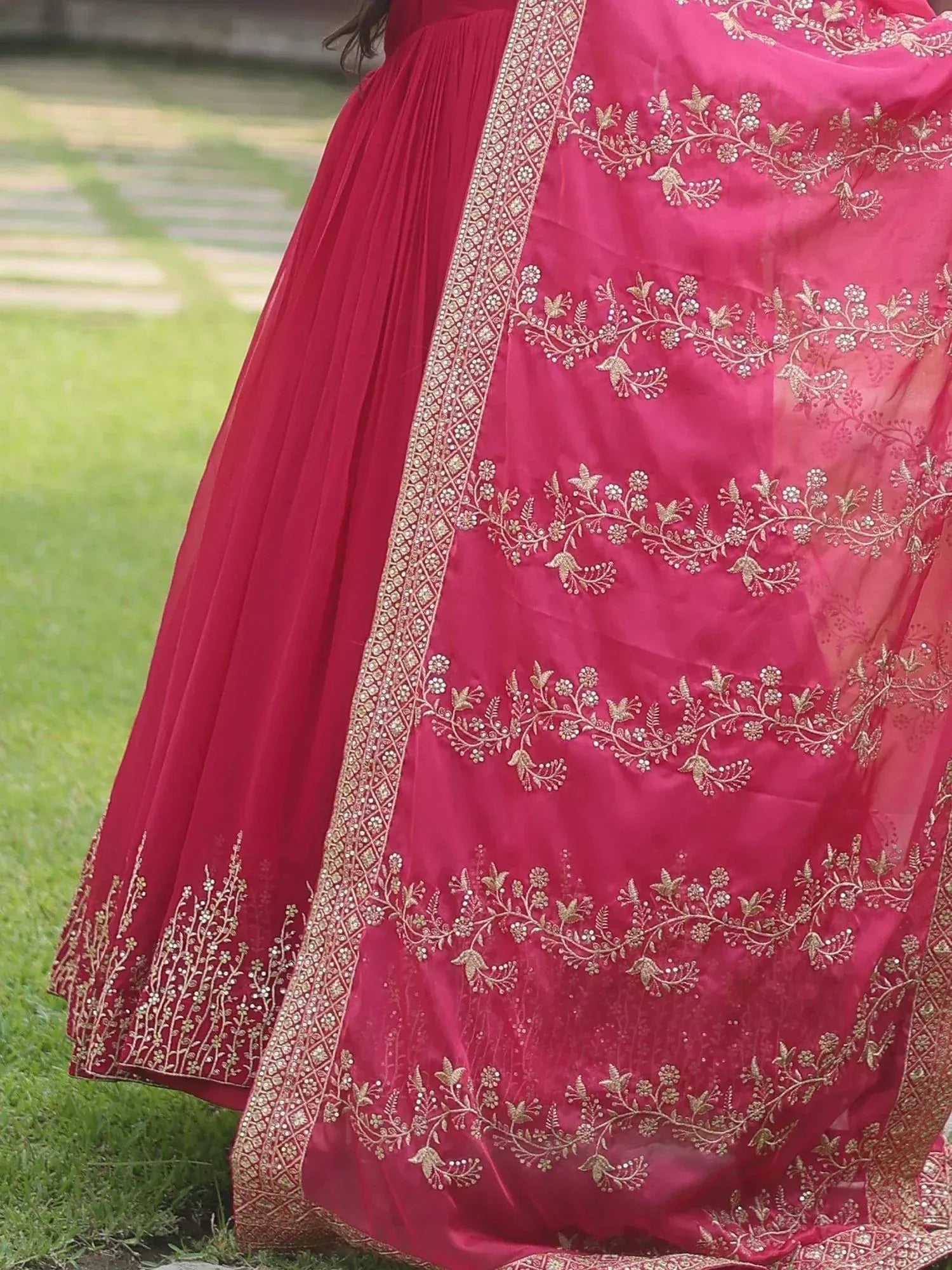 Pink embroidered lehenga choli with gold floral work, perfect for Indian ethnic wear occasions