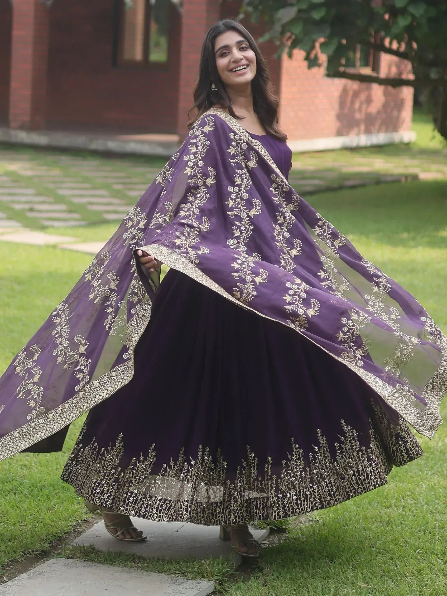Purple embroidered lehenga choli with gold floral work, perfect for Indian ethnic occasions