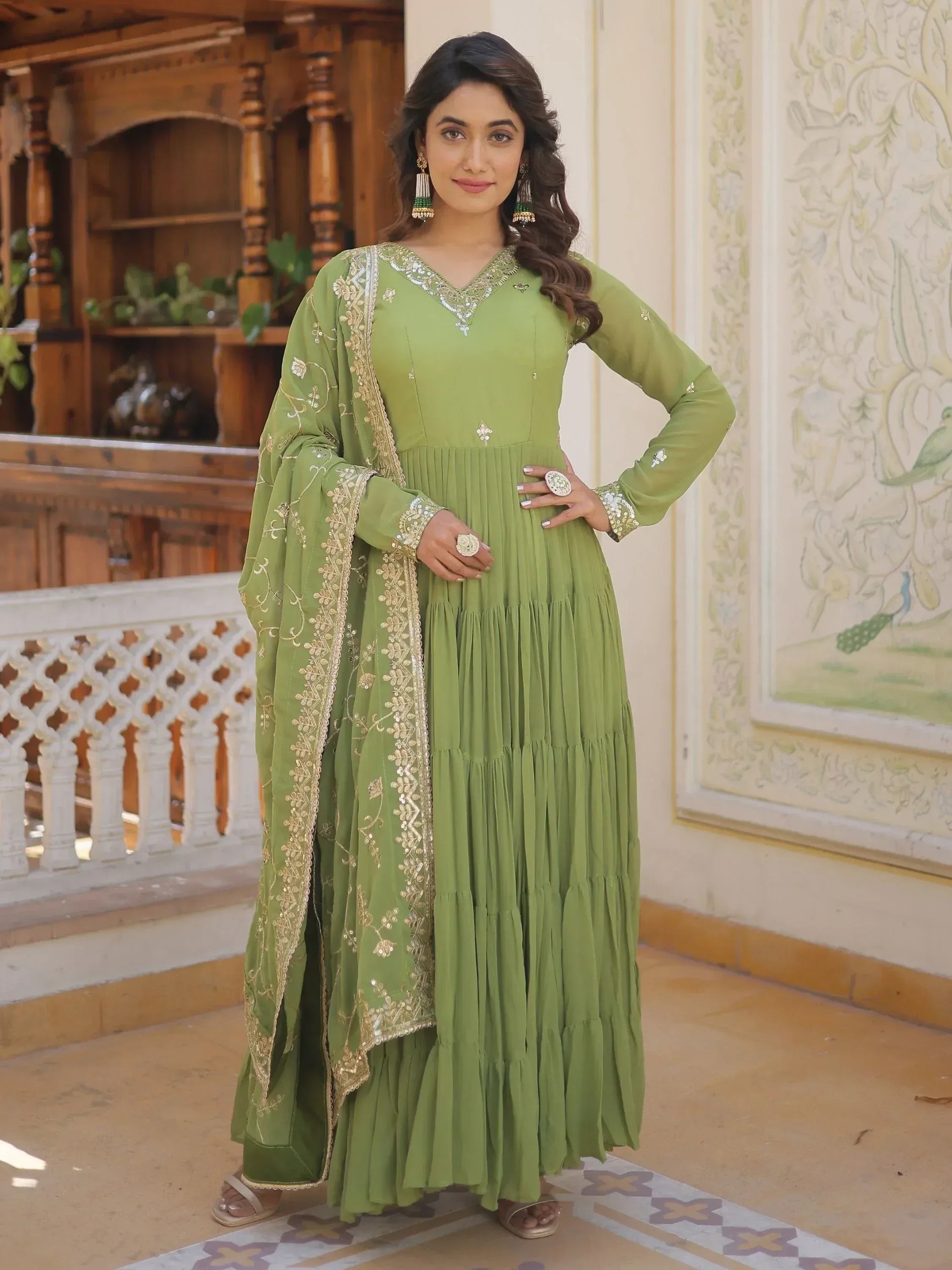 Green embroidered anarkali suit with gold detailing, perfect for Indian ethnic wear occasions