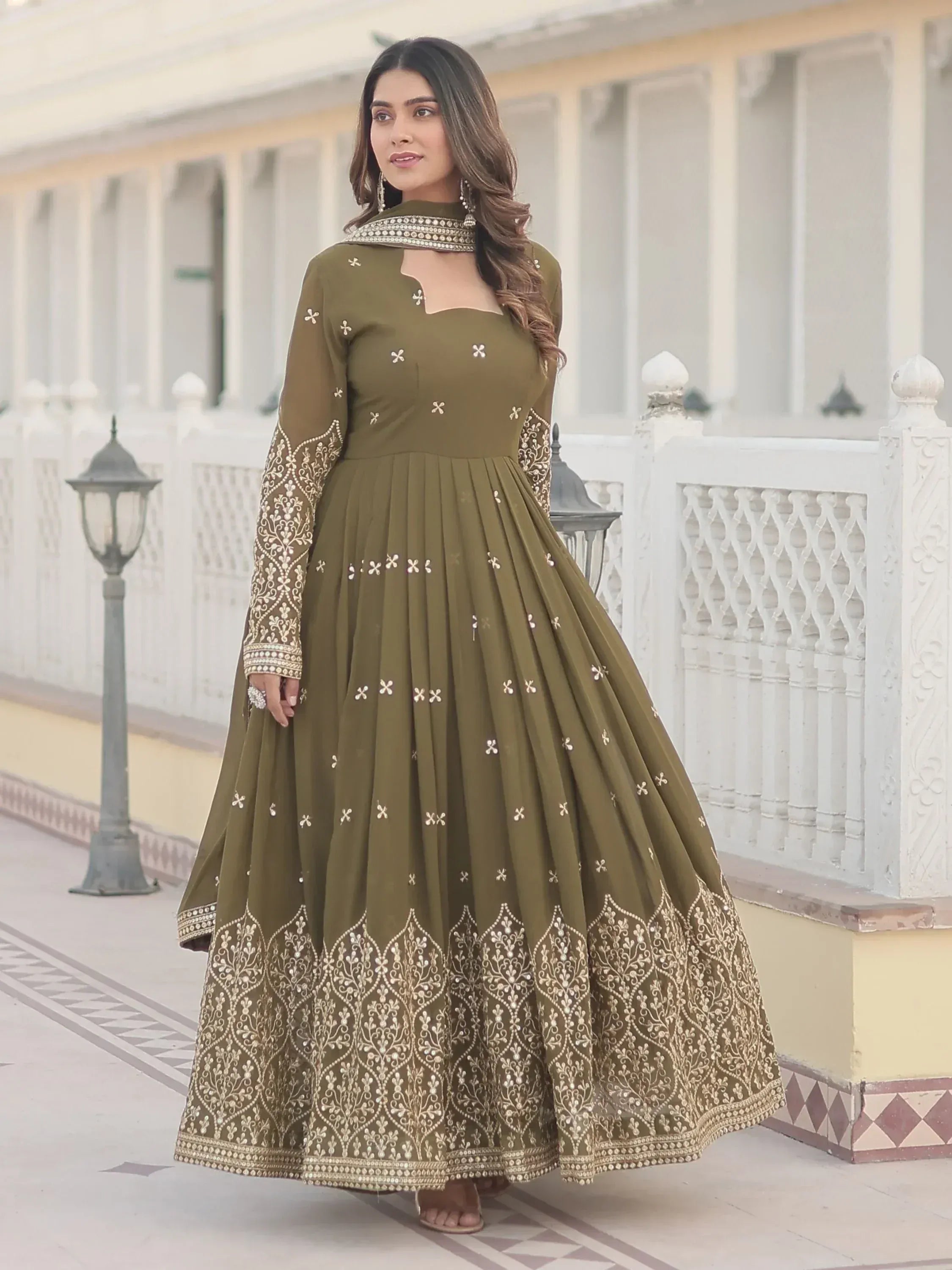Olive green embroidered anarkali gown with gold detailing, perfect for Indian ethnic occasions