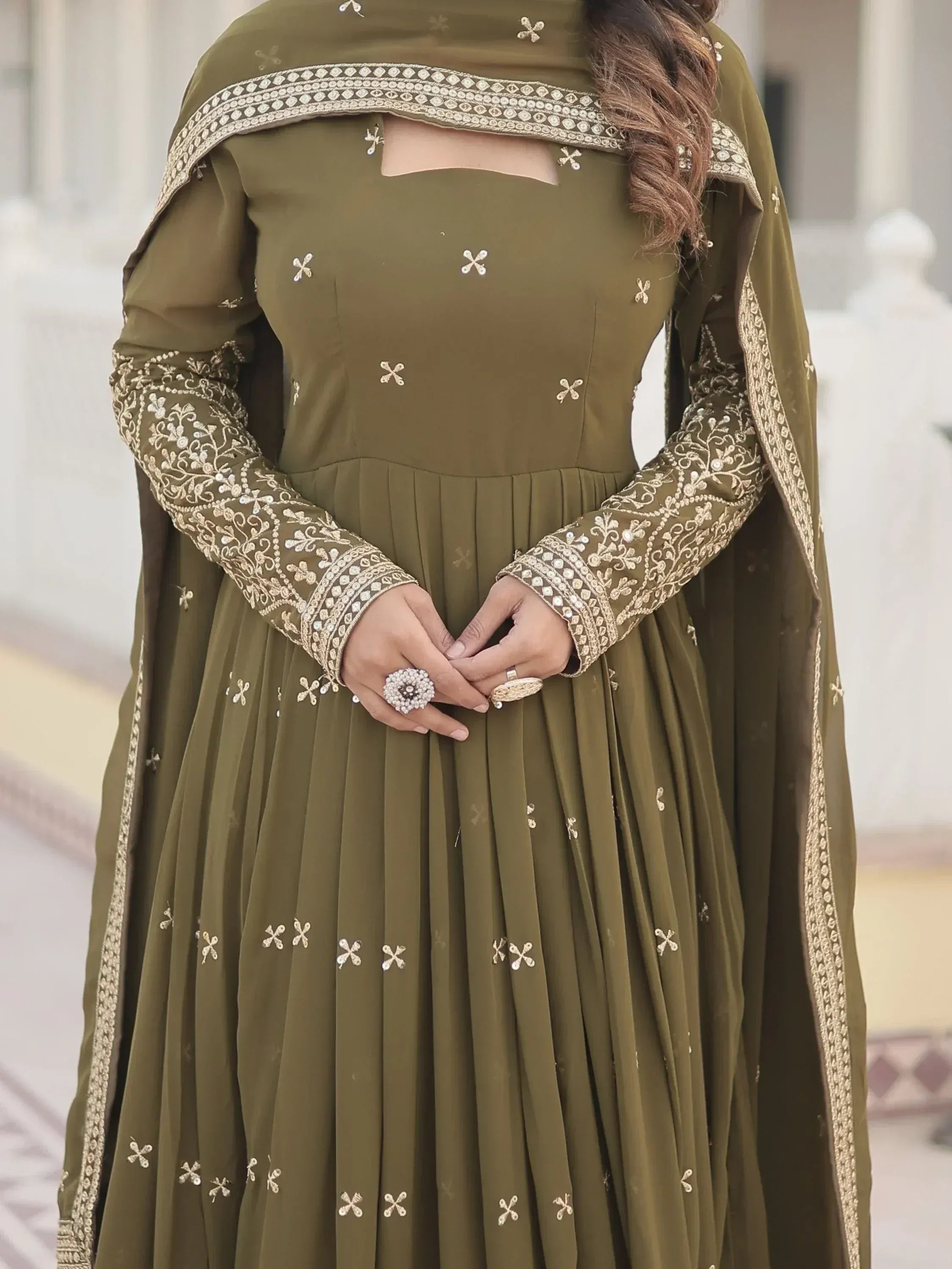 Olive green embroidered anarkali with gold detailing, perfect for Indian ethnic wear occasions.