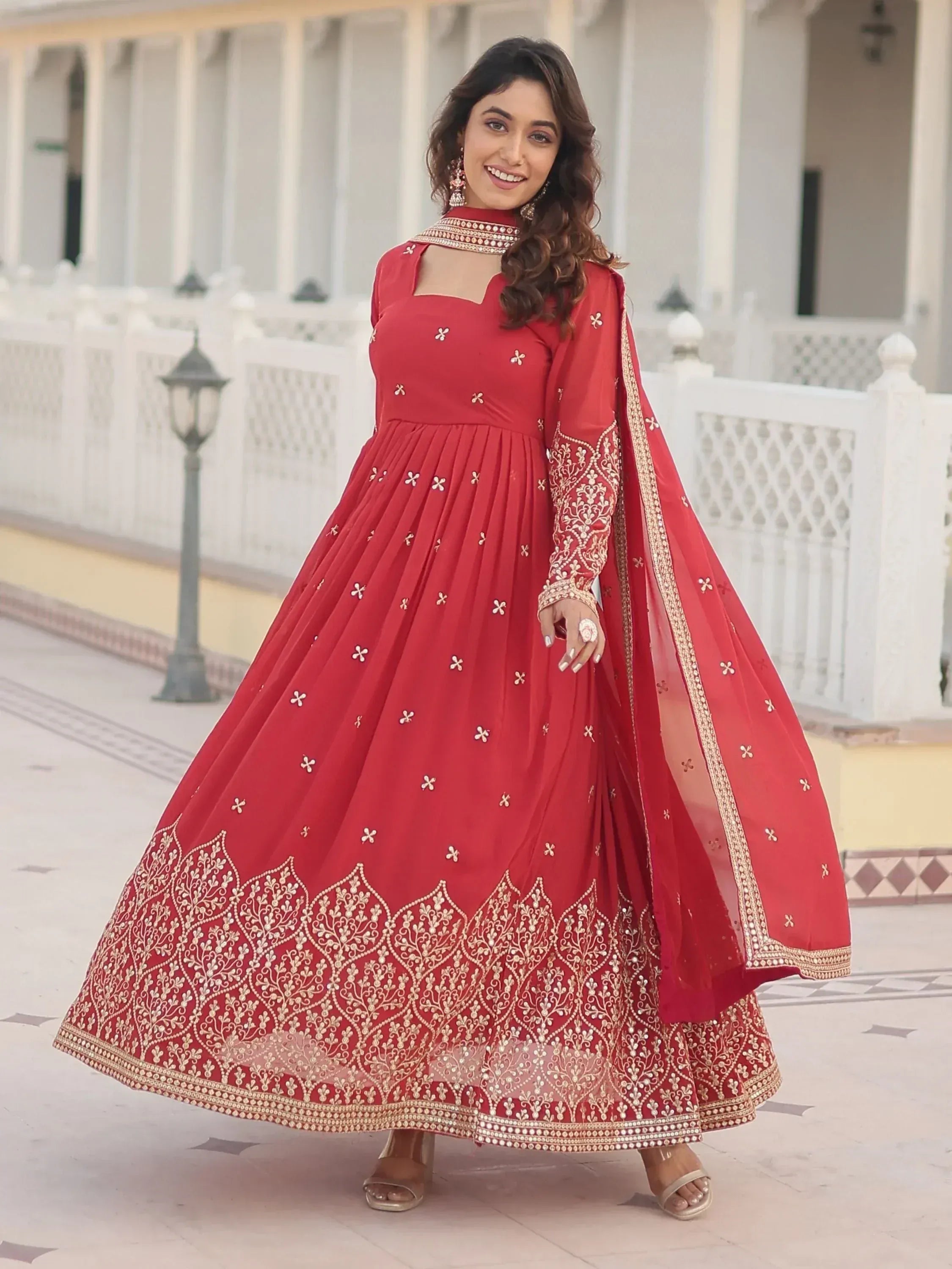 Red embroidered anarkali gown with gold detailing, perfect for Indian ethnic wear occasions